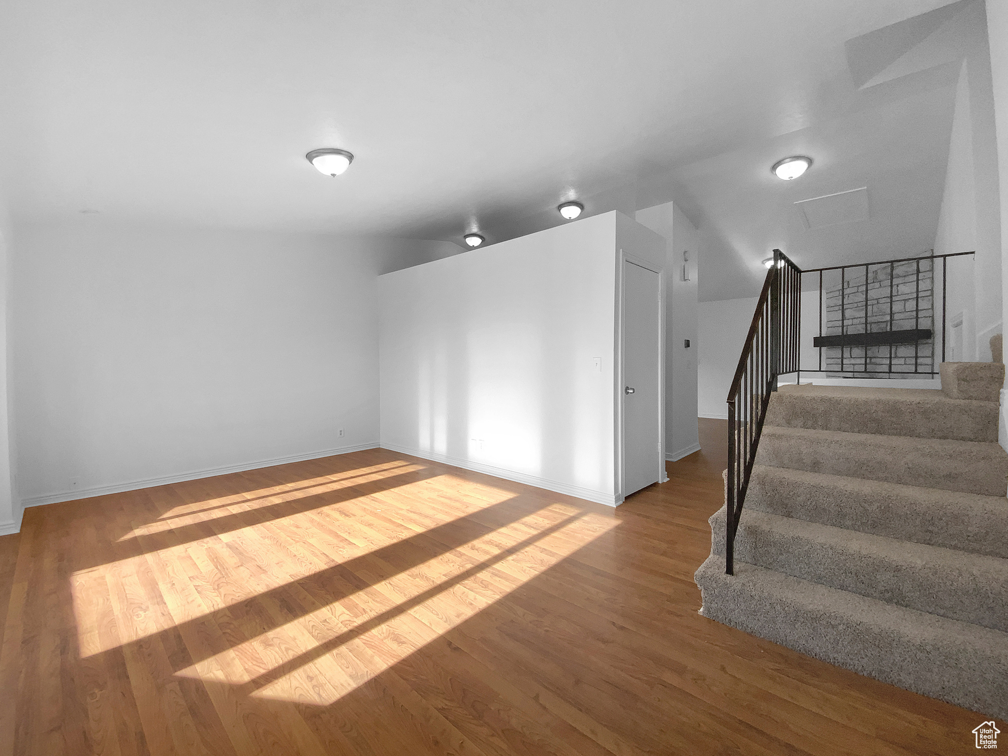 Interior space with hardwood / wood-style floors