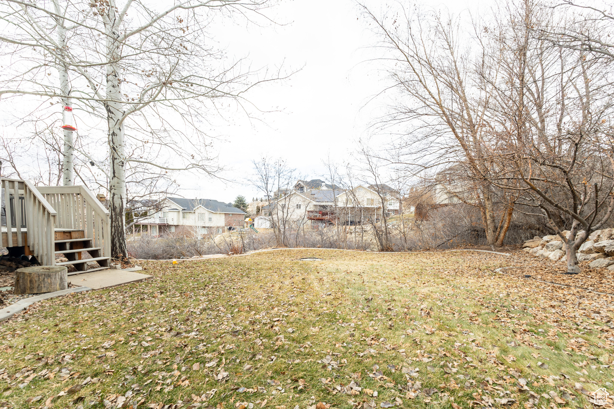 View of yard with a deck
