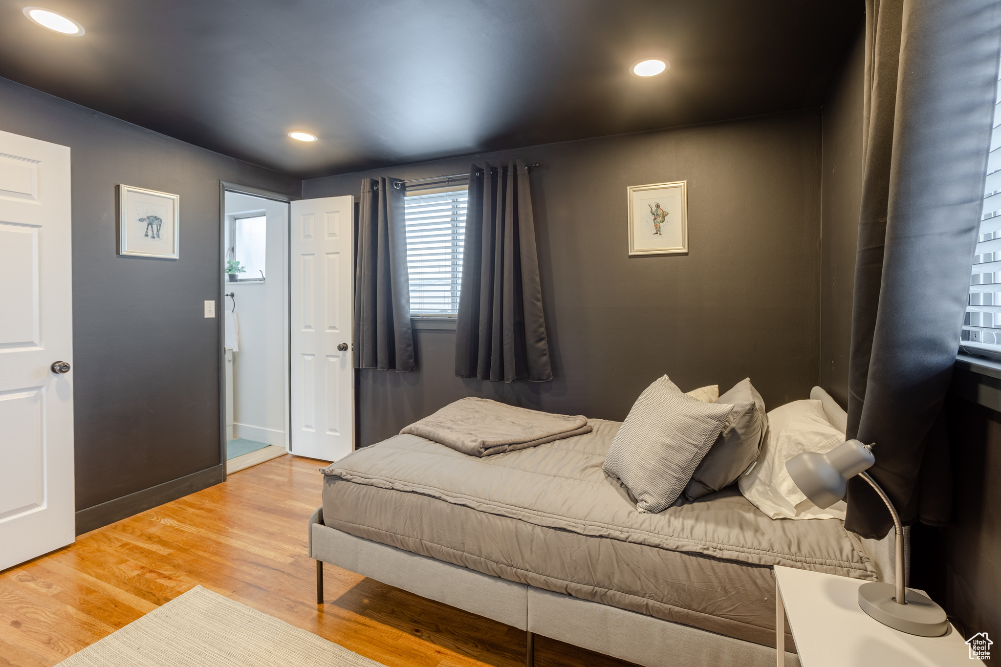Bedroom featuring wood-type flooring