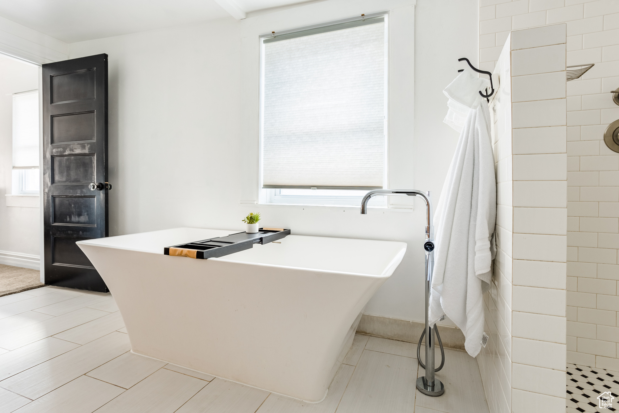 Bathroom with plus walk in shower