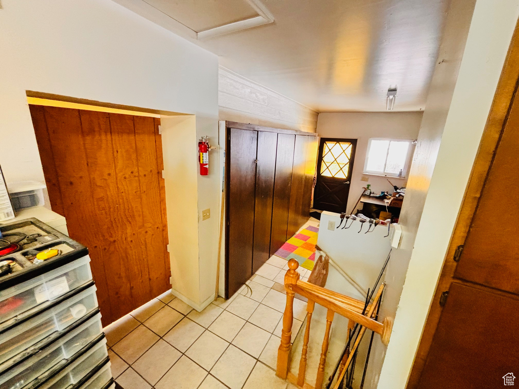 Kitchen featuring light tile patterned floors