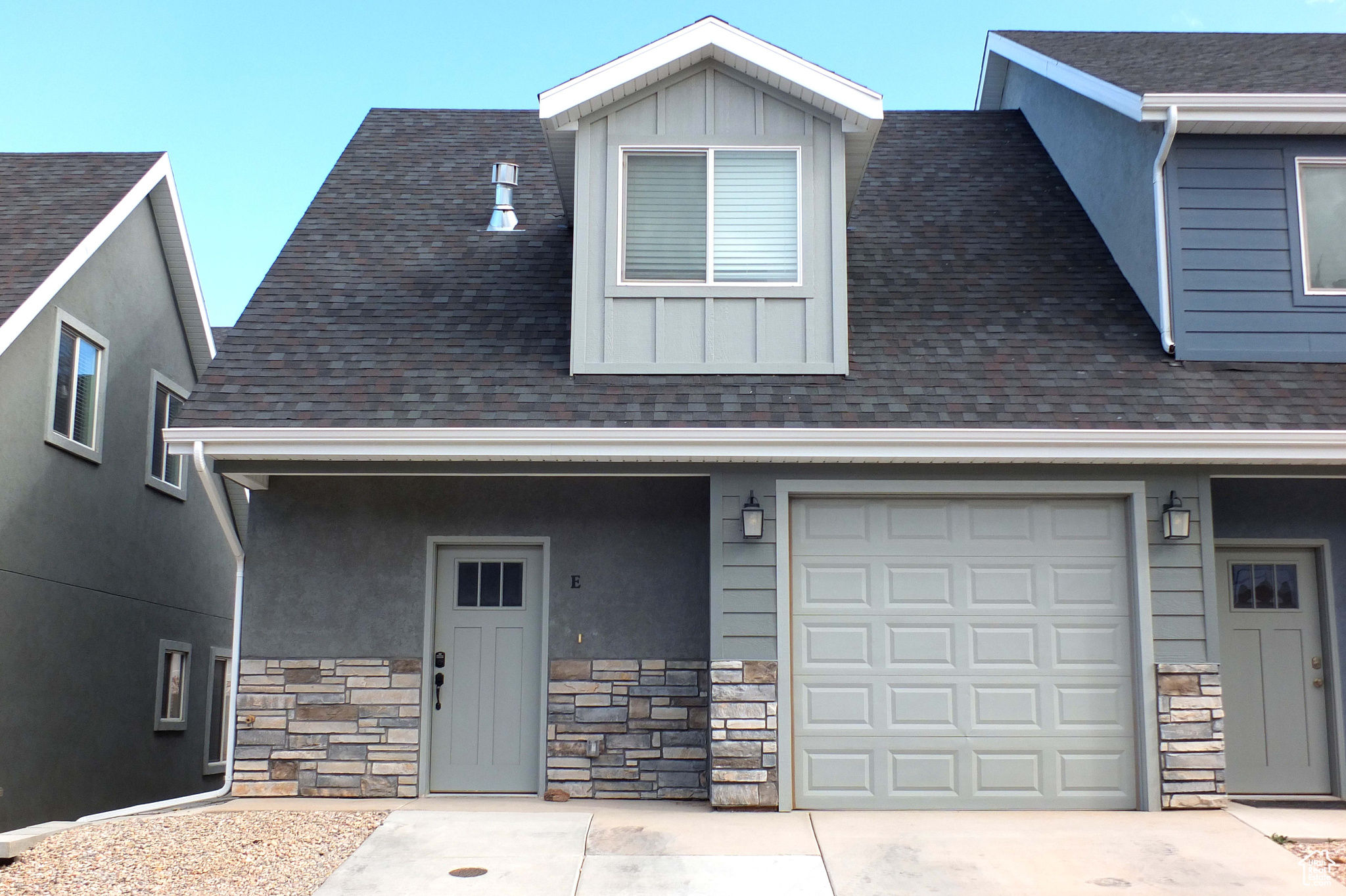 View of front of home featuring a garage
