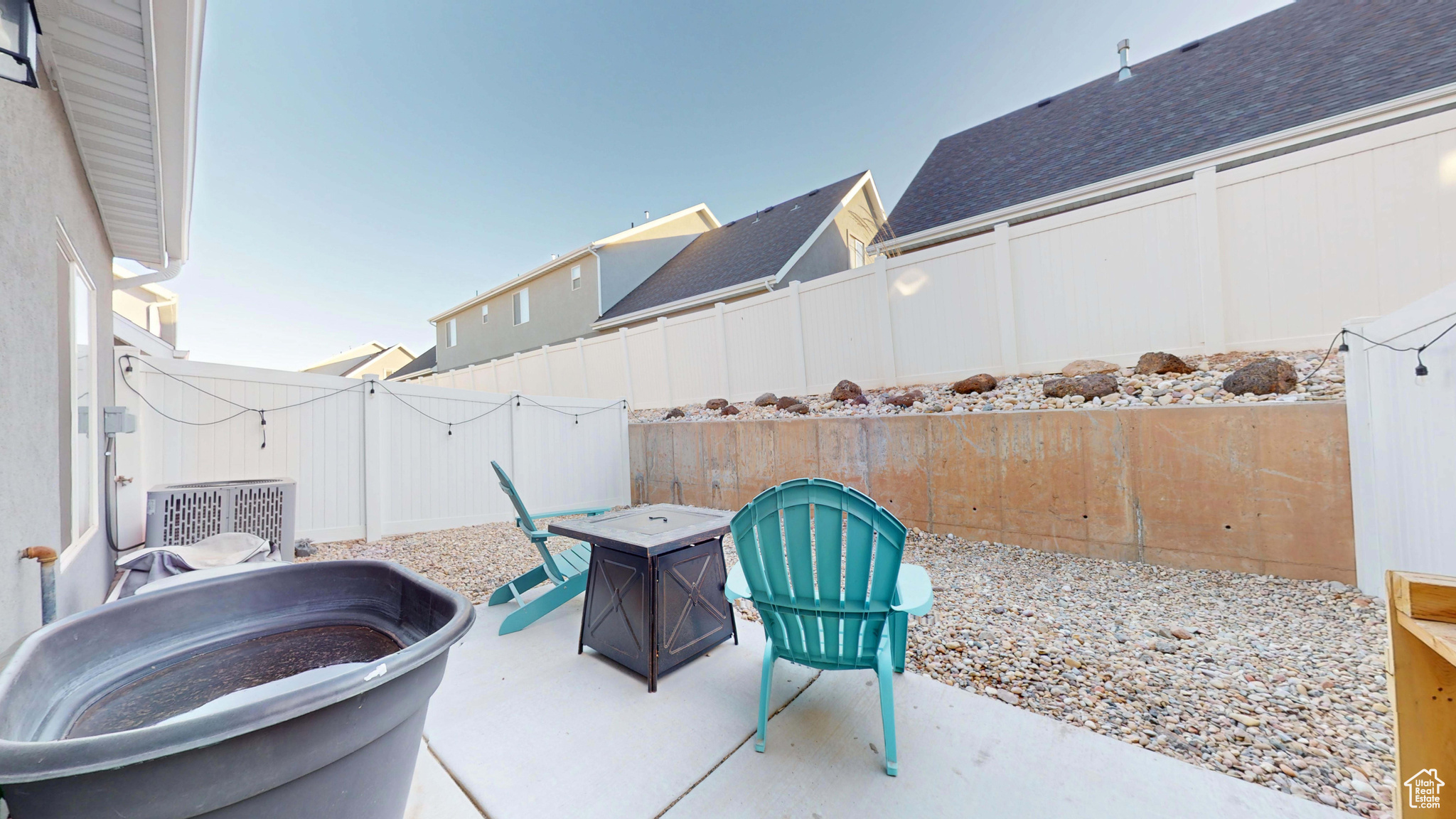 View of patio / terrace with an outdoor fire pit