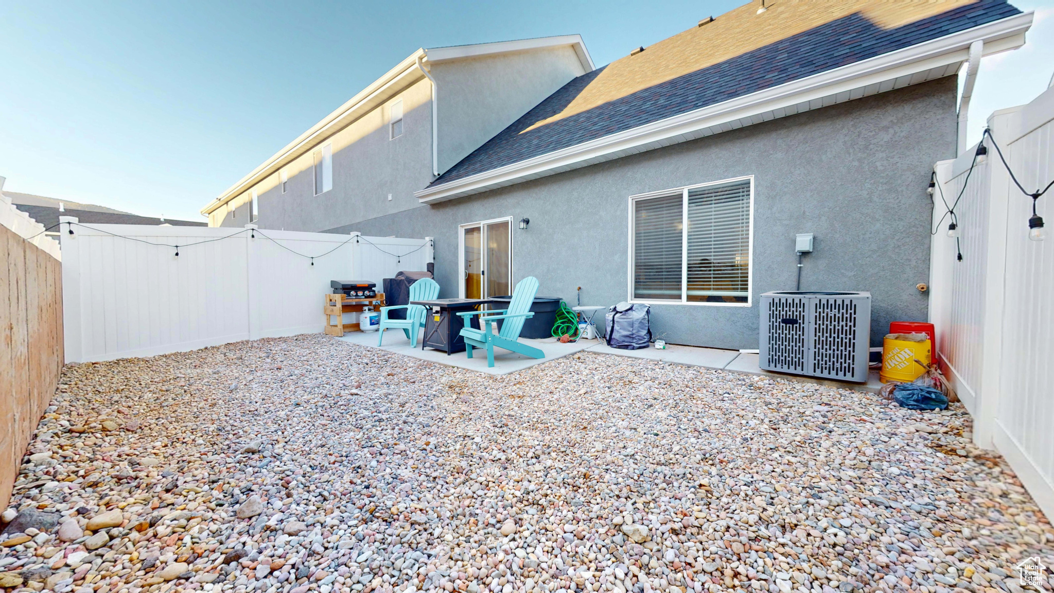 Back of property featuring a patio and cooling unit