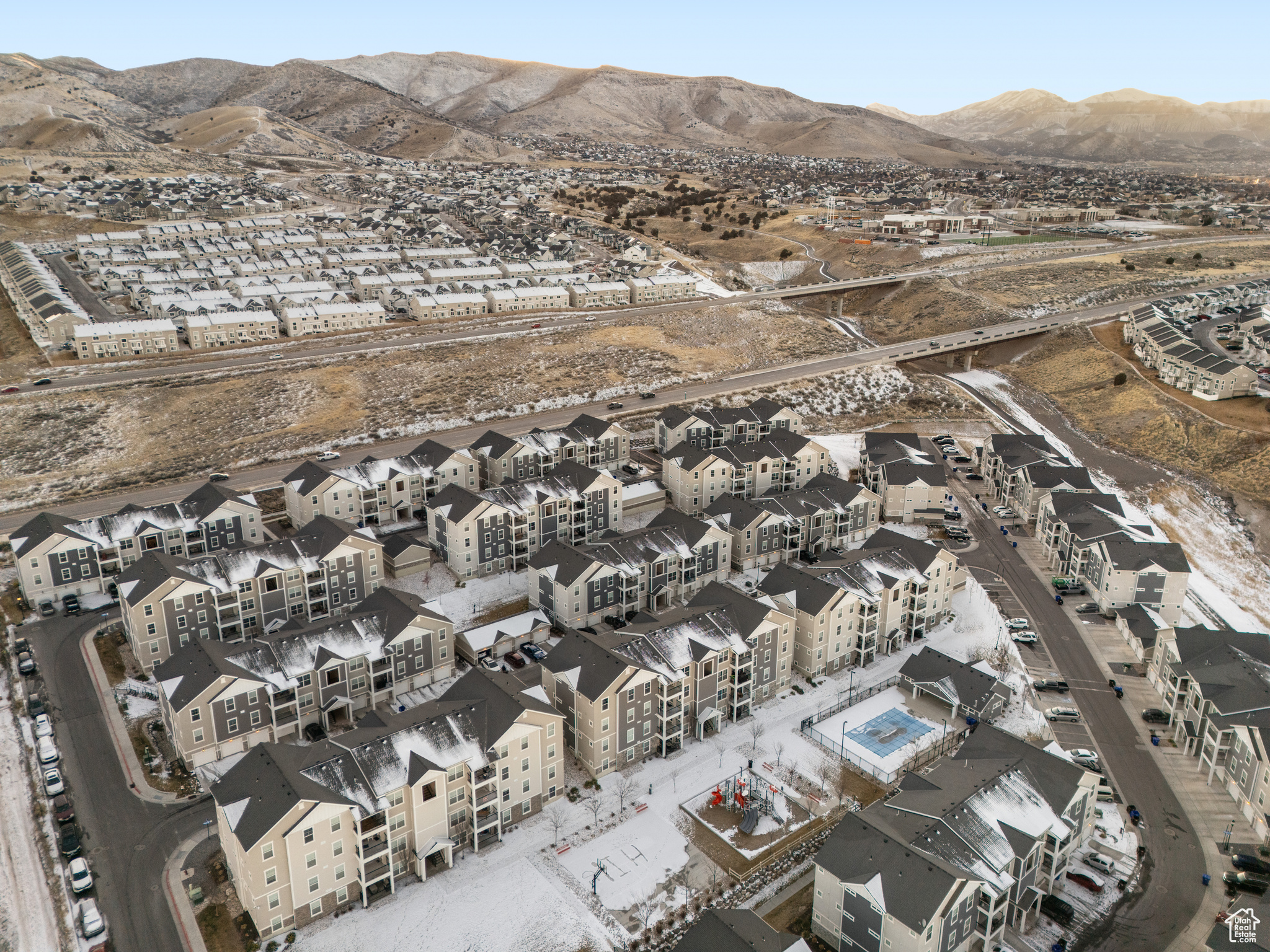 Birds eye view of property with a mountain view