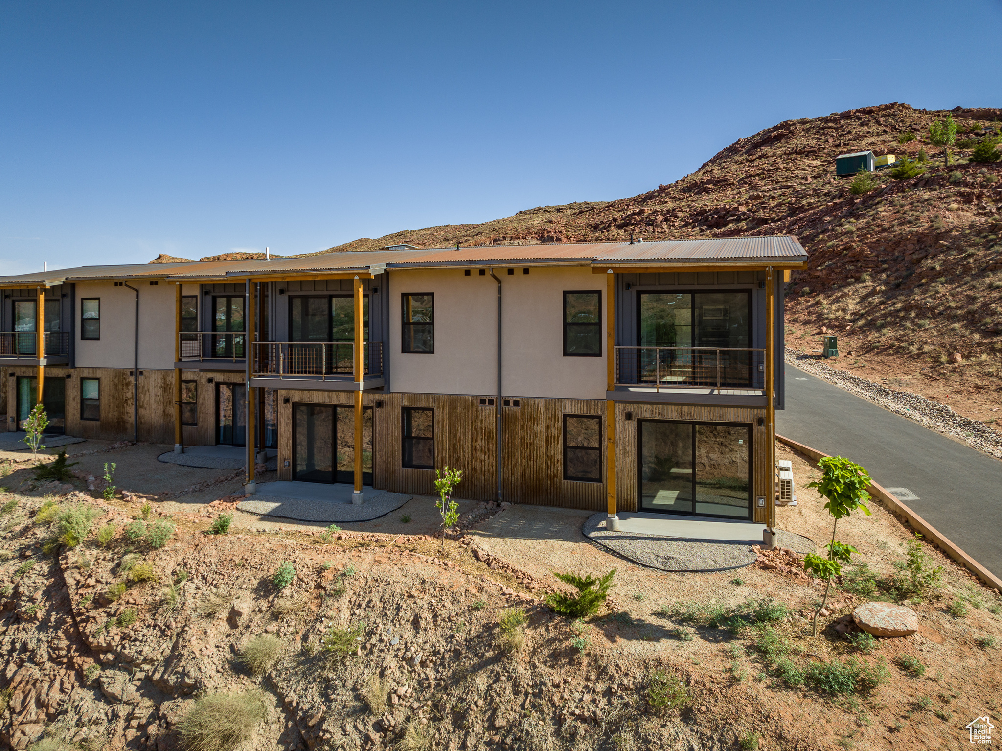 Rear view of house featuring a patio area