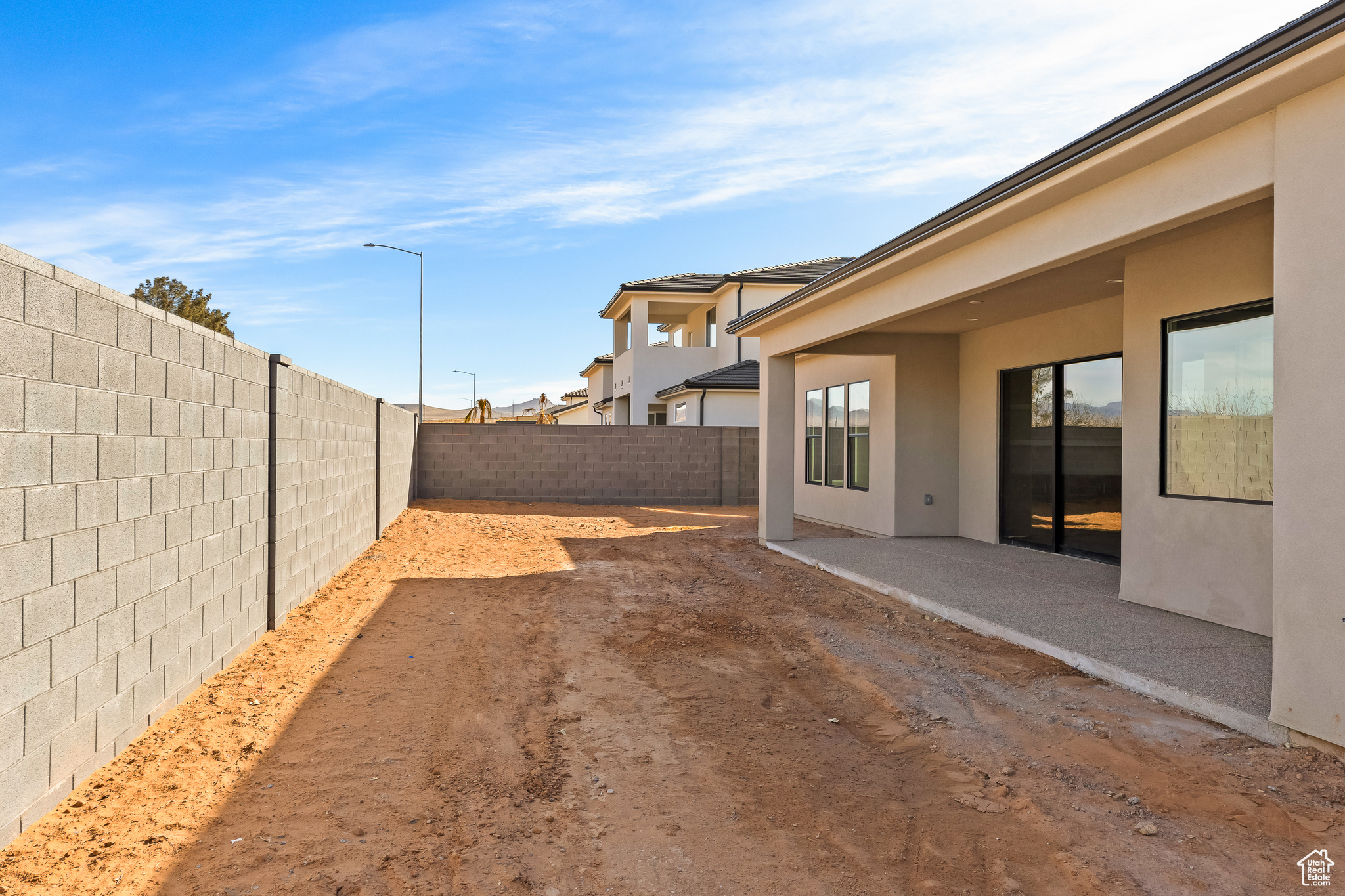 View of yard featuring a patio area and a fenced backyard