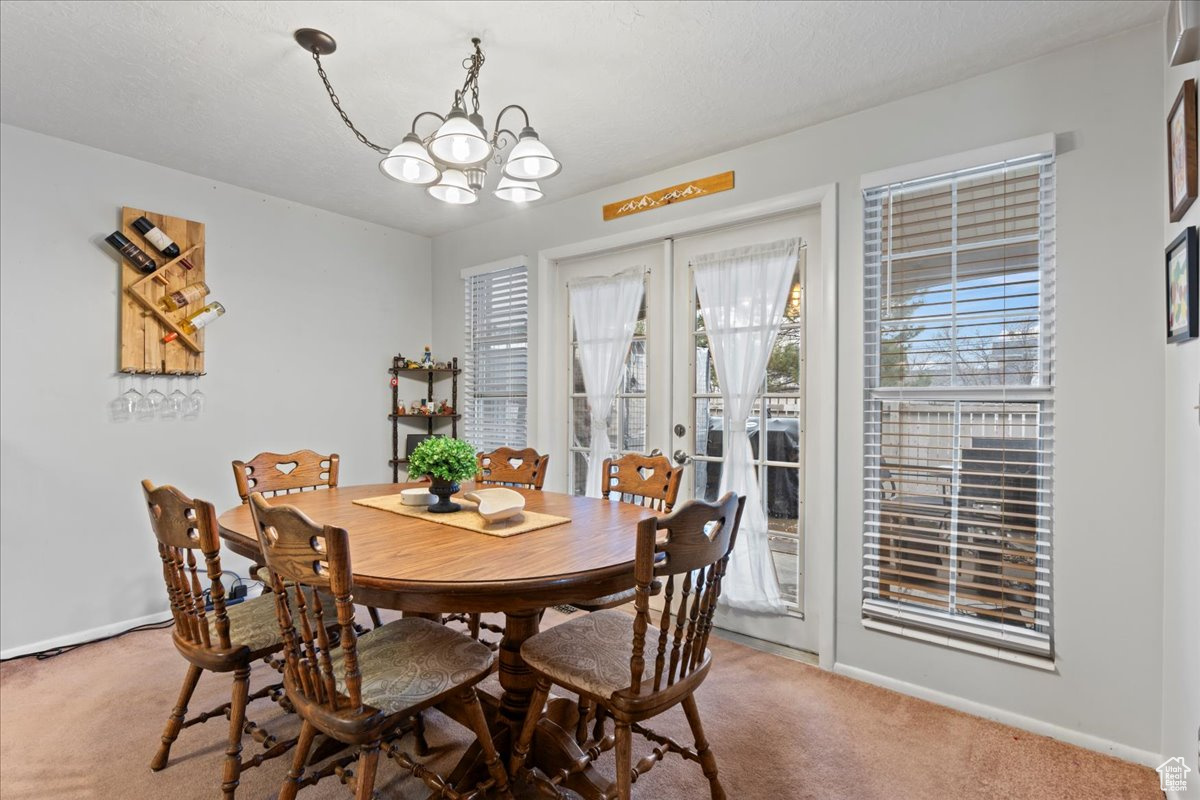 Beautiful French doors leading to an enclosed patio.