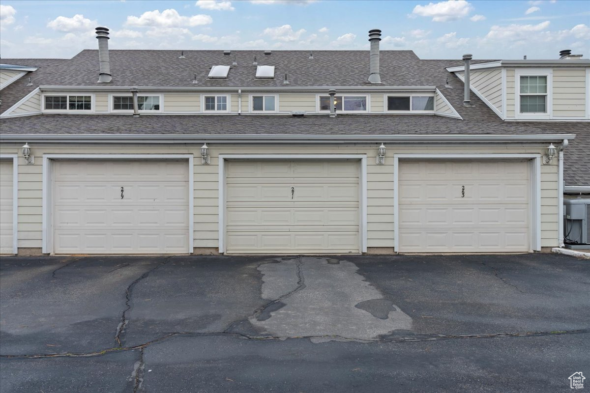 One car garage and one outside parking for this unit.