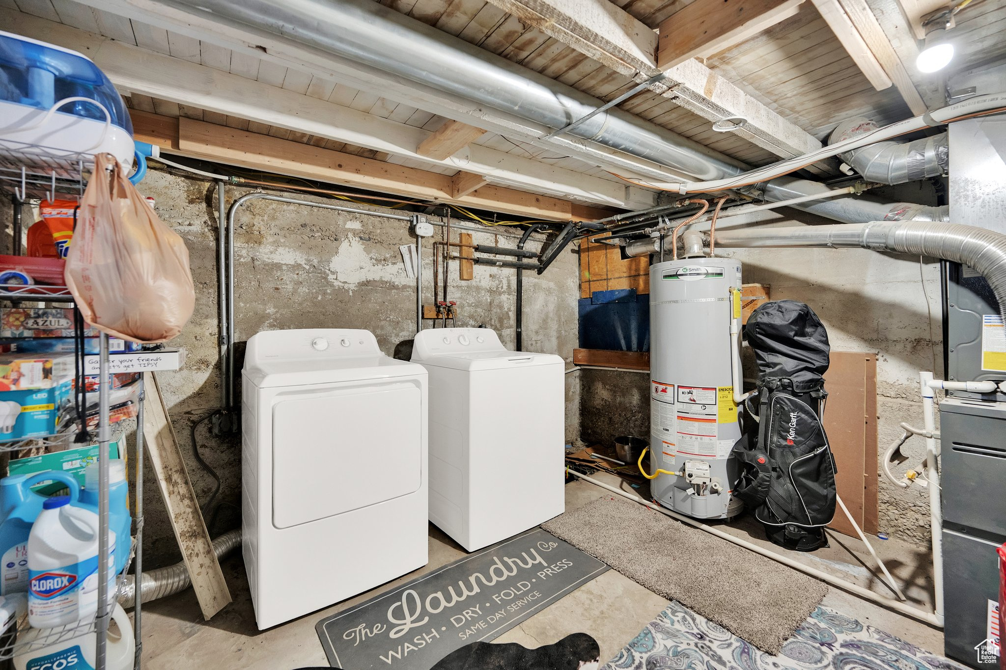 Interior space with water heater and independent washer and dryer