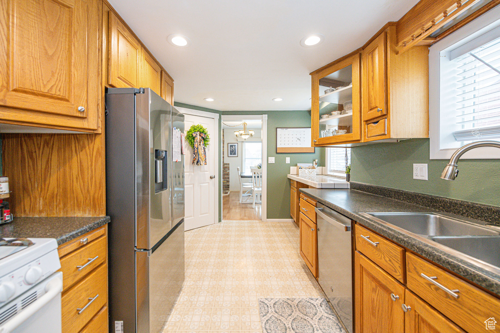 Kitchen with sink and stainless steel appliances