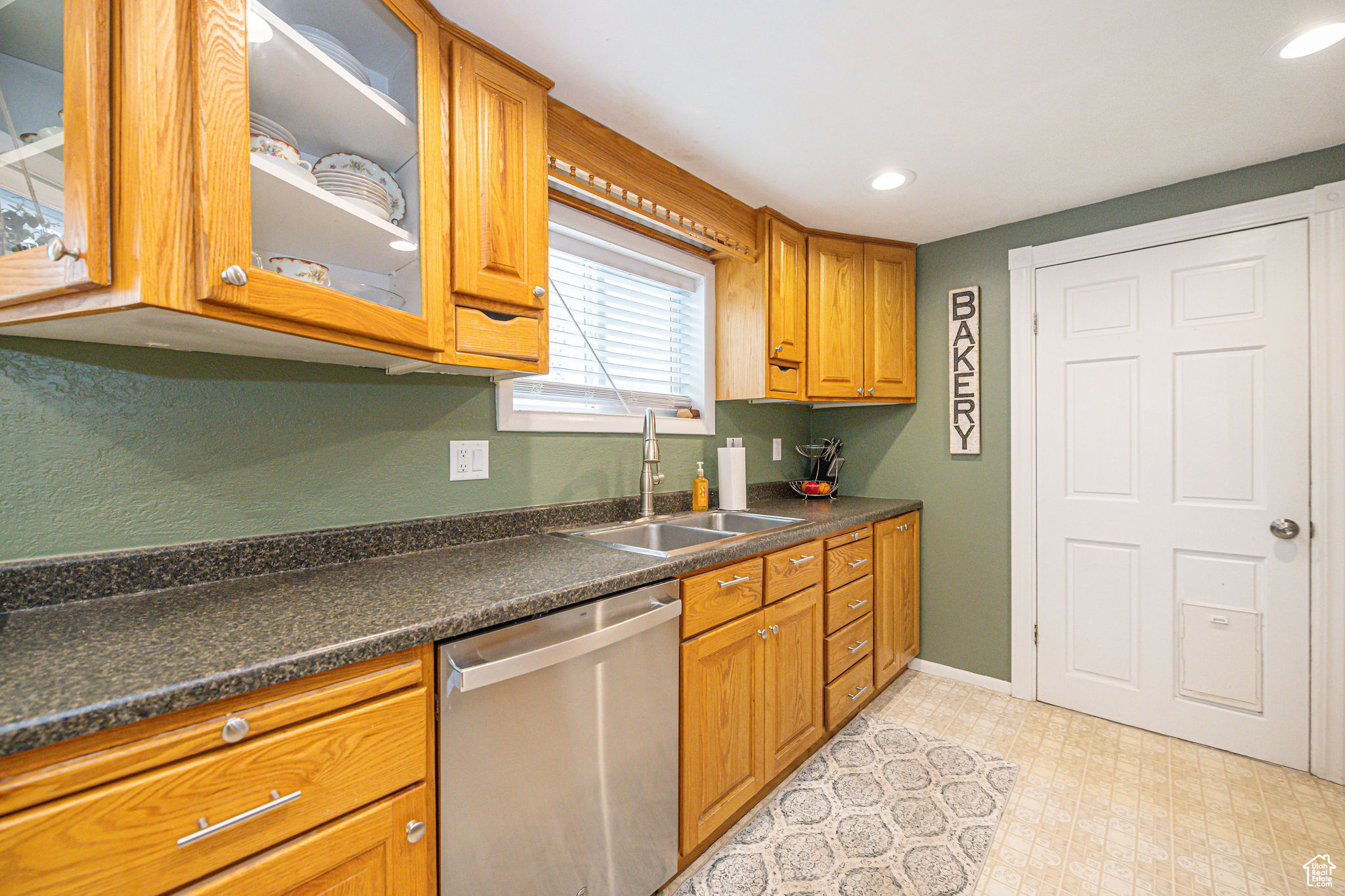 Kitchen featuring sink and dishwasher