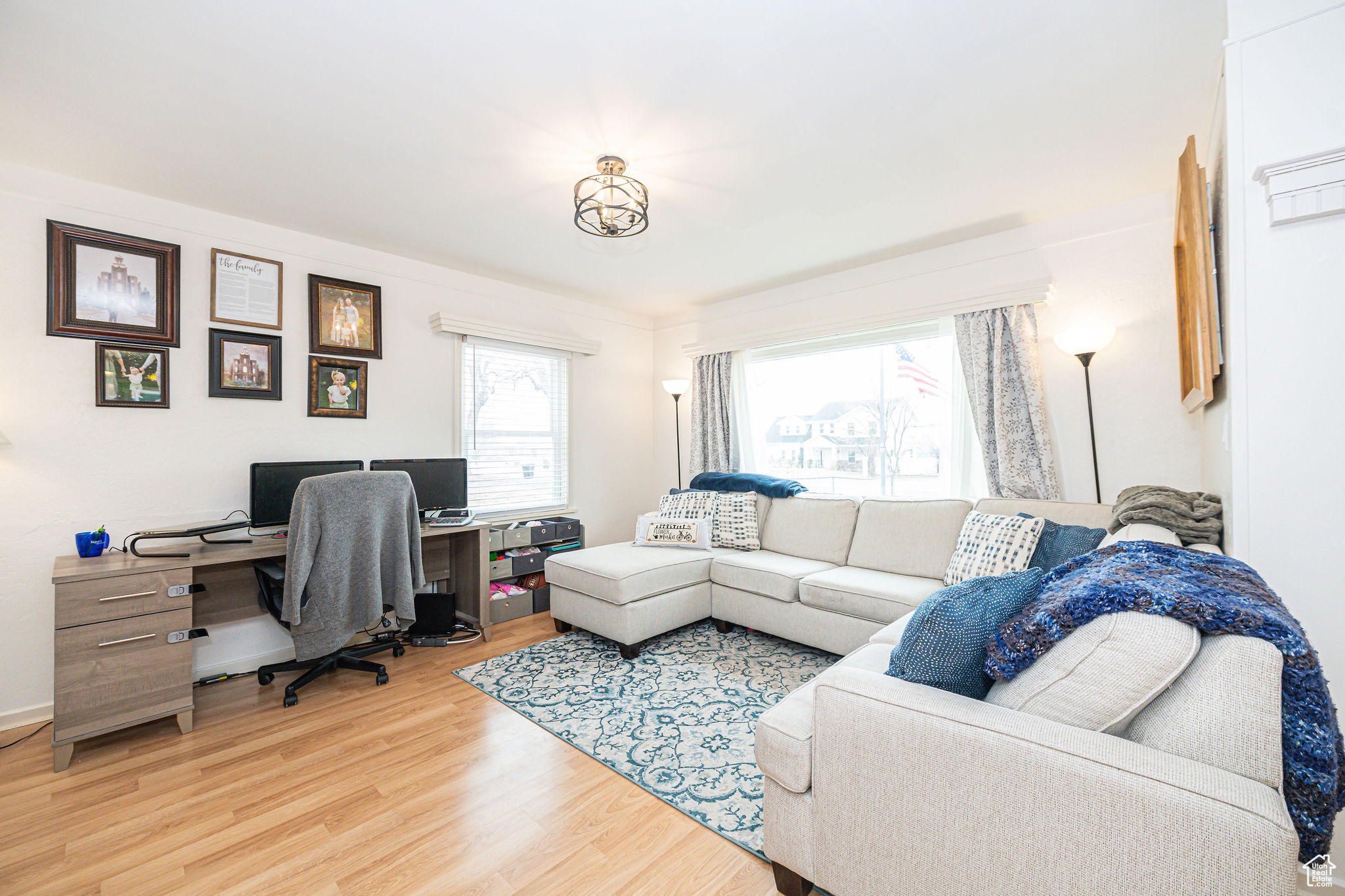 Living area with light hardwood / wood-style floors