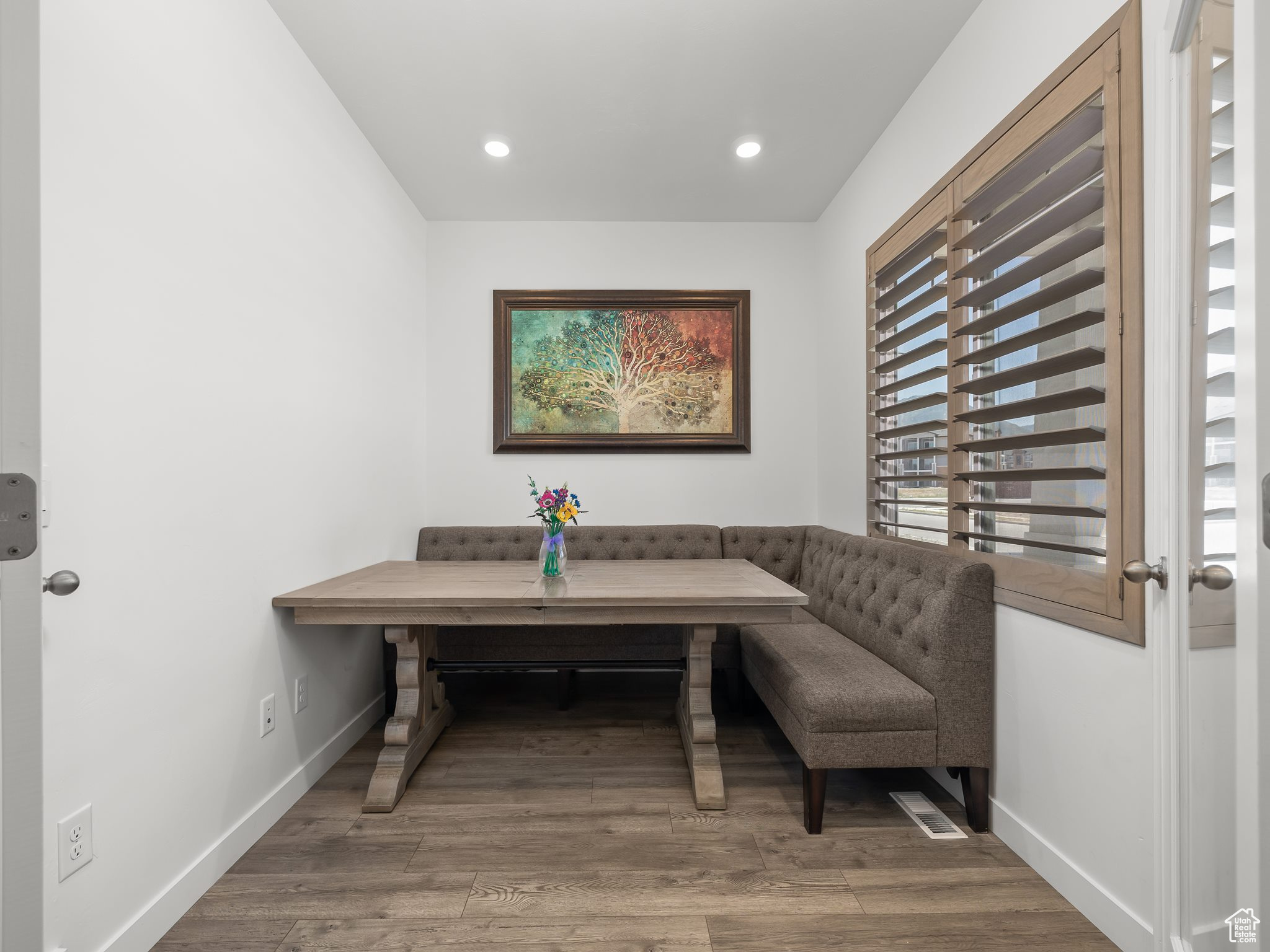 Interior space with wood-type flooring and breakfast area