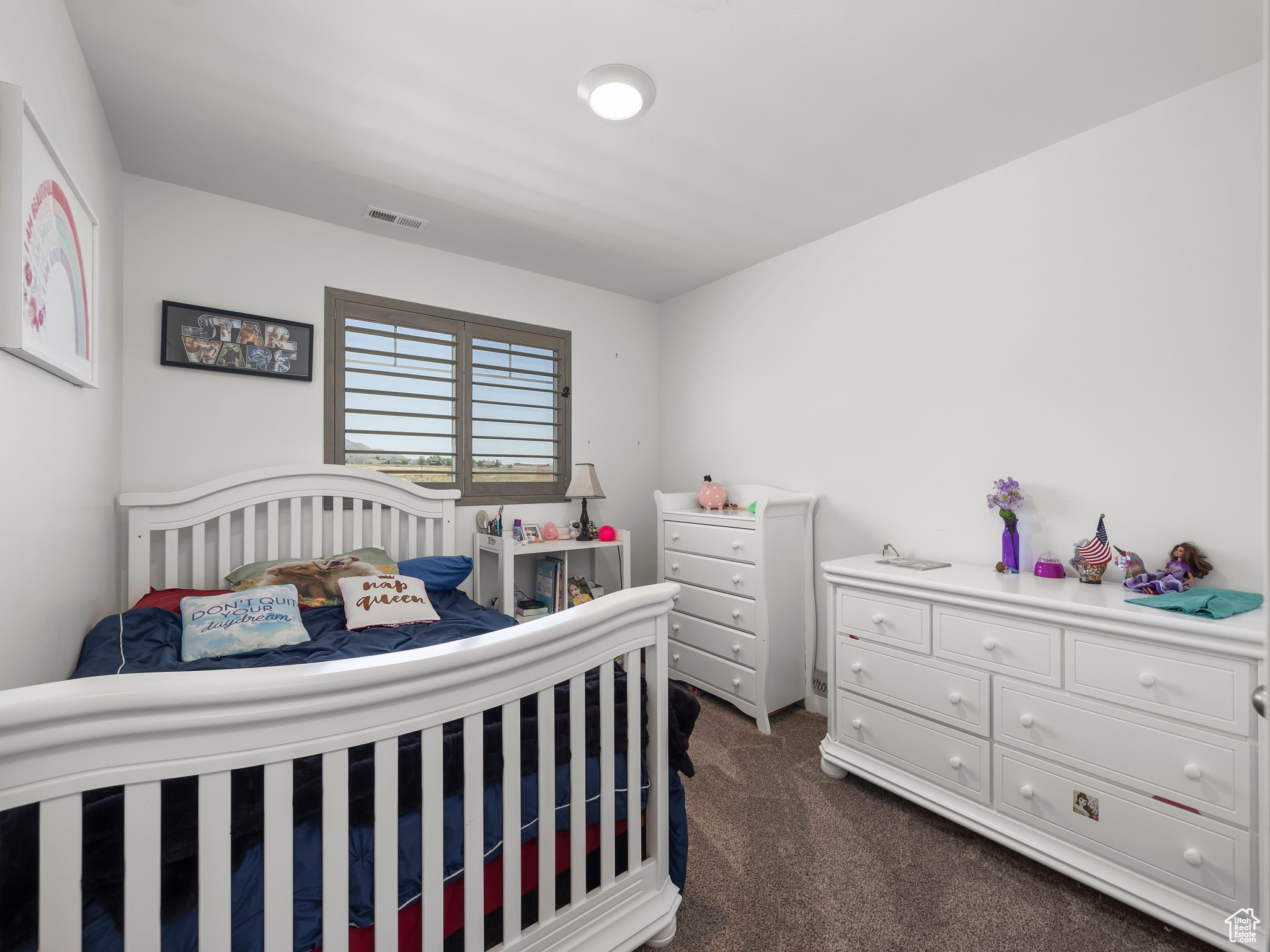 View of carpeted bedroom