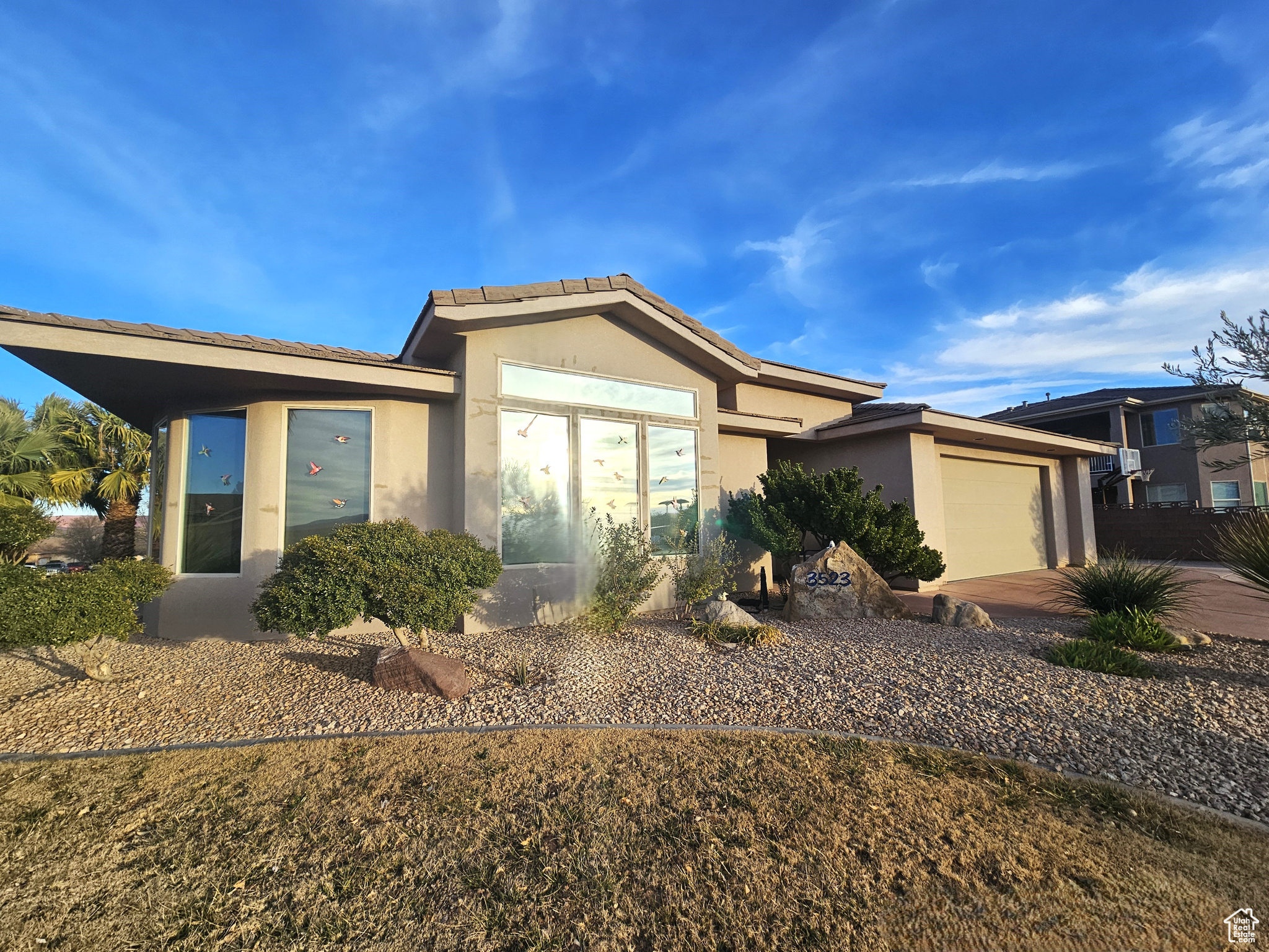 View of front of home featuring a garage