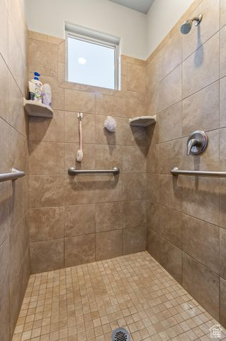 Bathroom with tiled shower