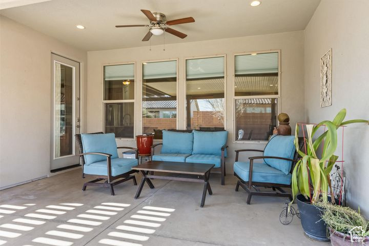 View of patio / terrace with ceiling fan and outdoor lounge area