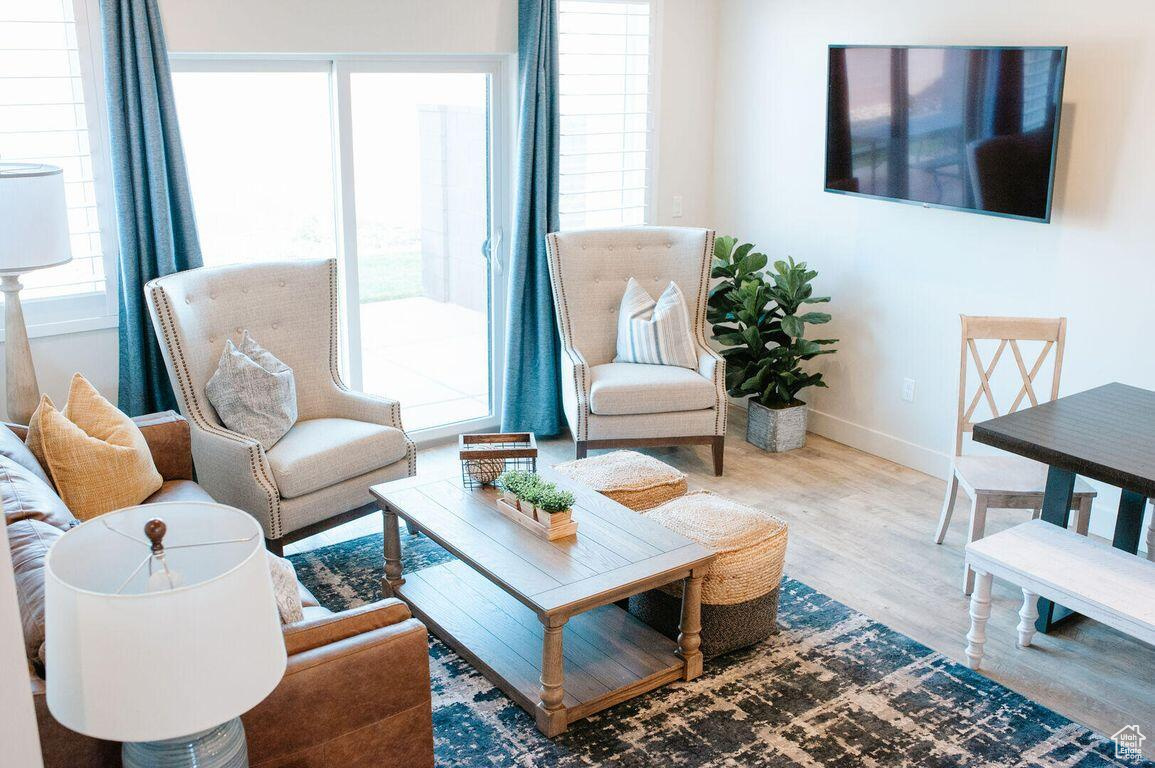 Living room with hardwood / wood-style floors