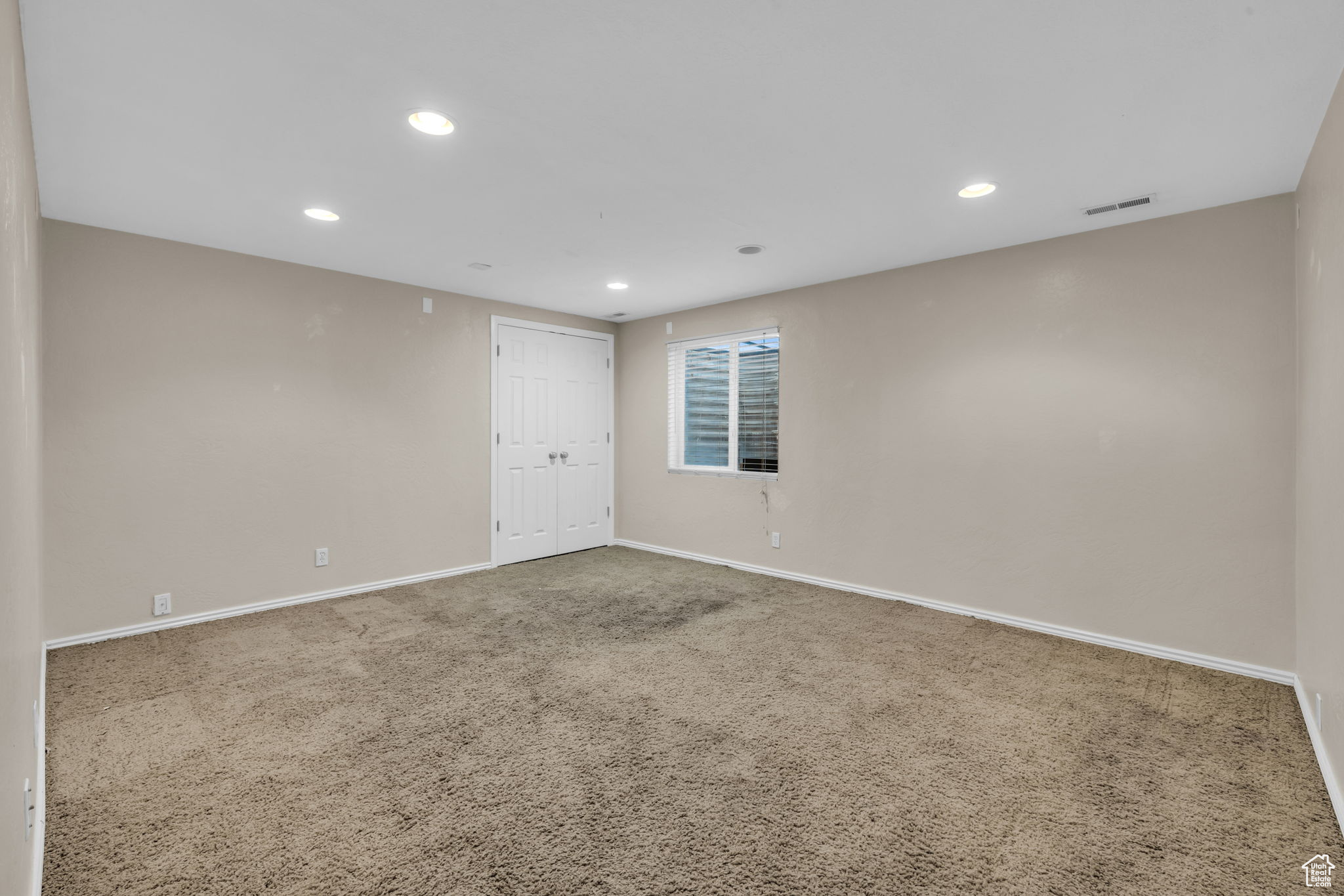 Spare room with carpet floors
