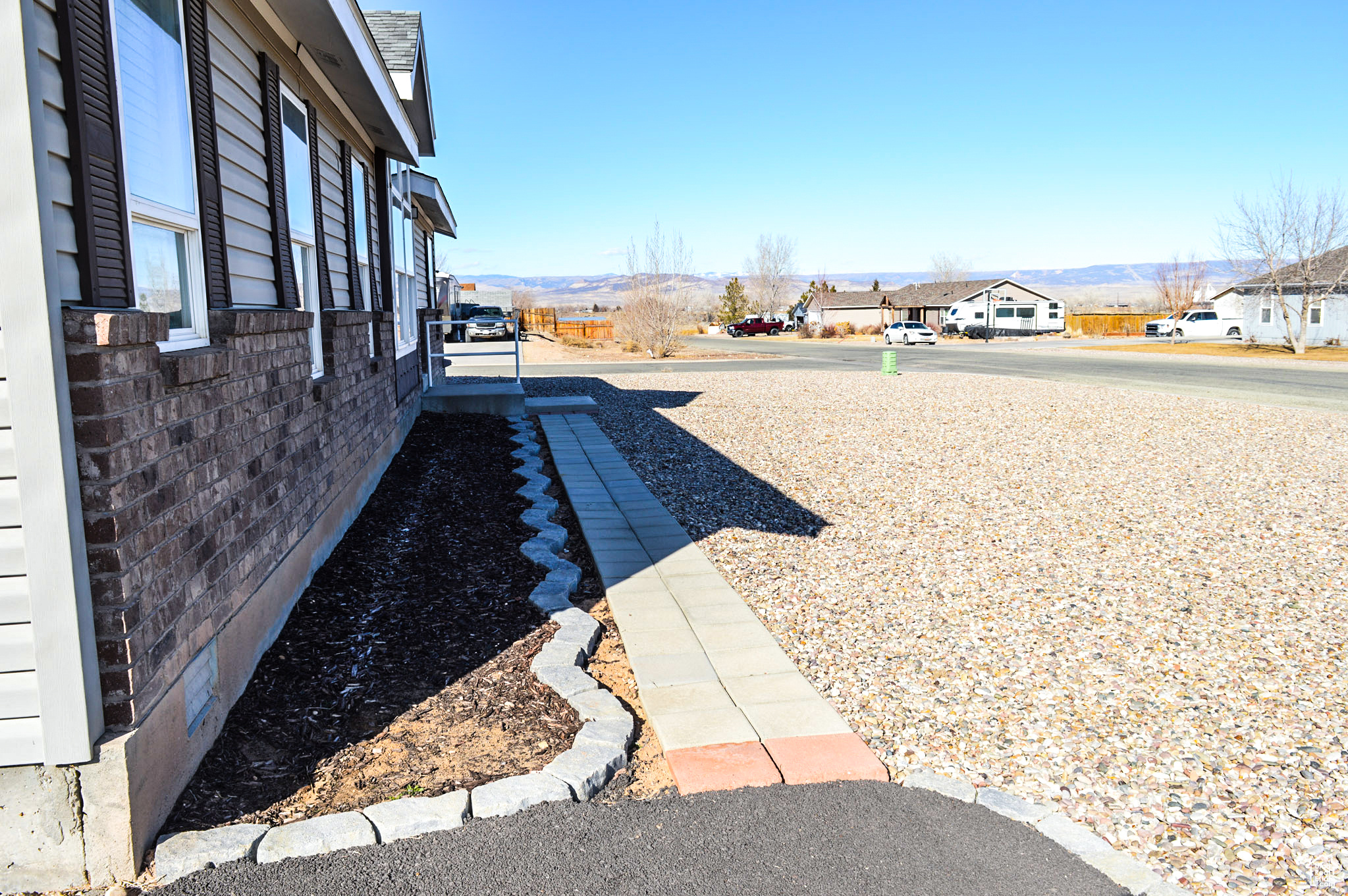 New sturdy railings for entry and updated landscaping details
