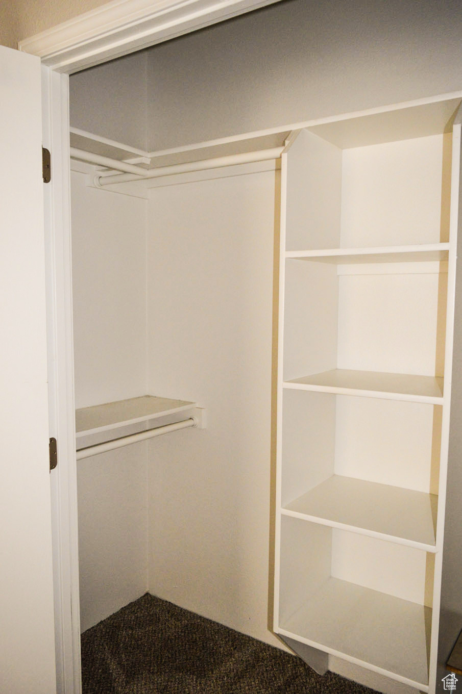 View of master bedroom closet-left side.