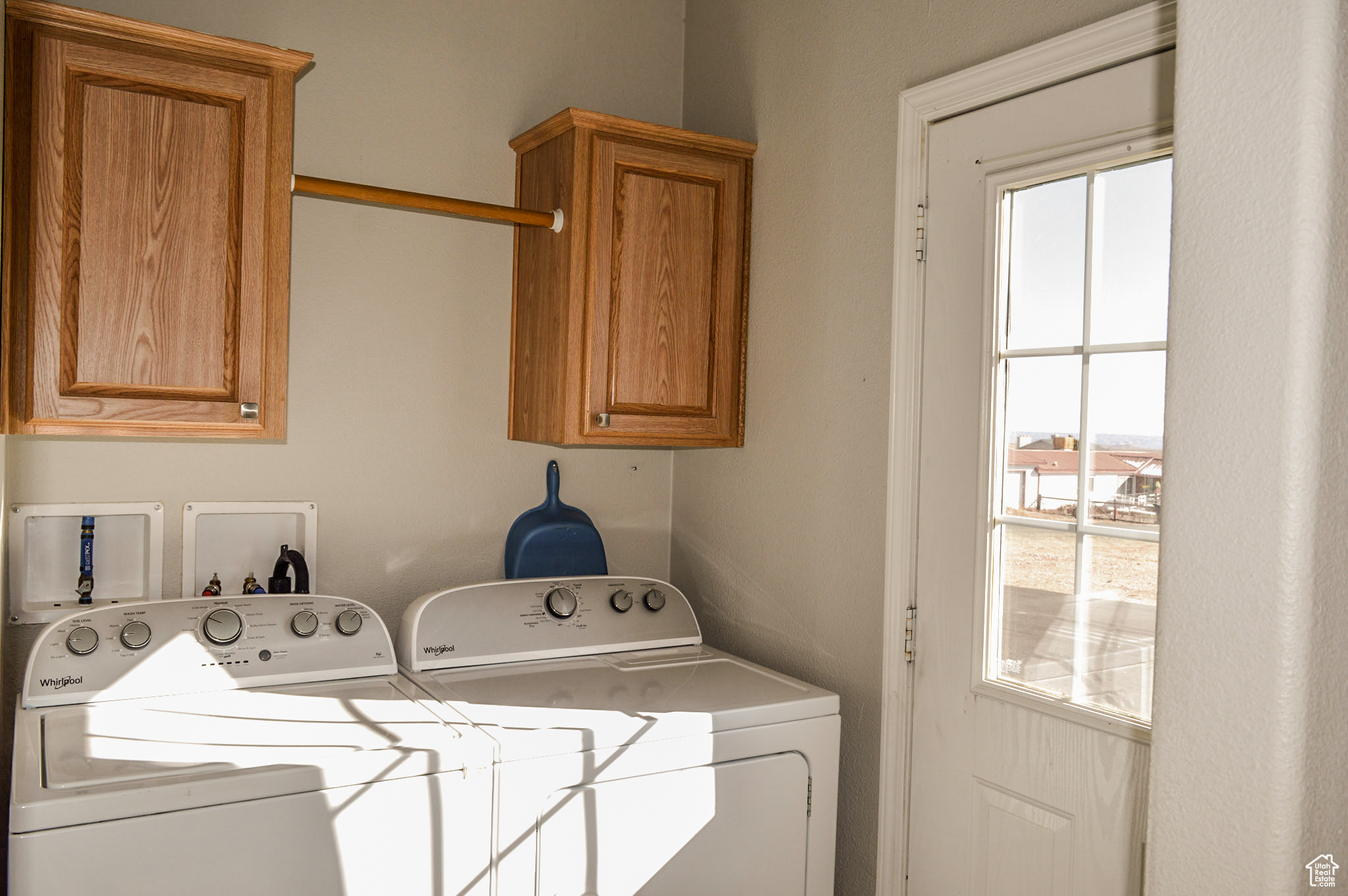 Laundry room by back entry off kitchen. (washer and dryer not included)