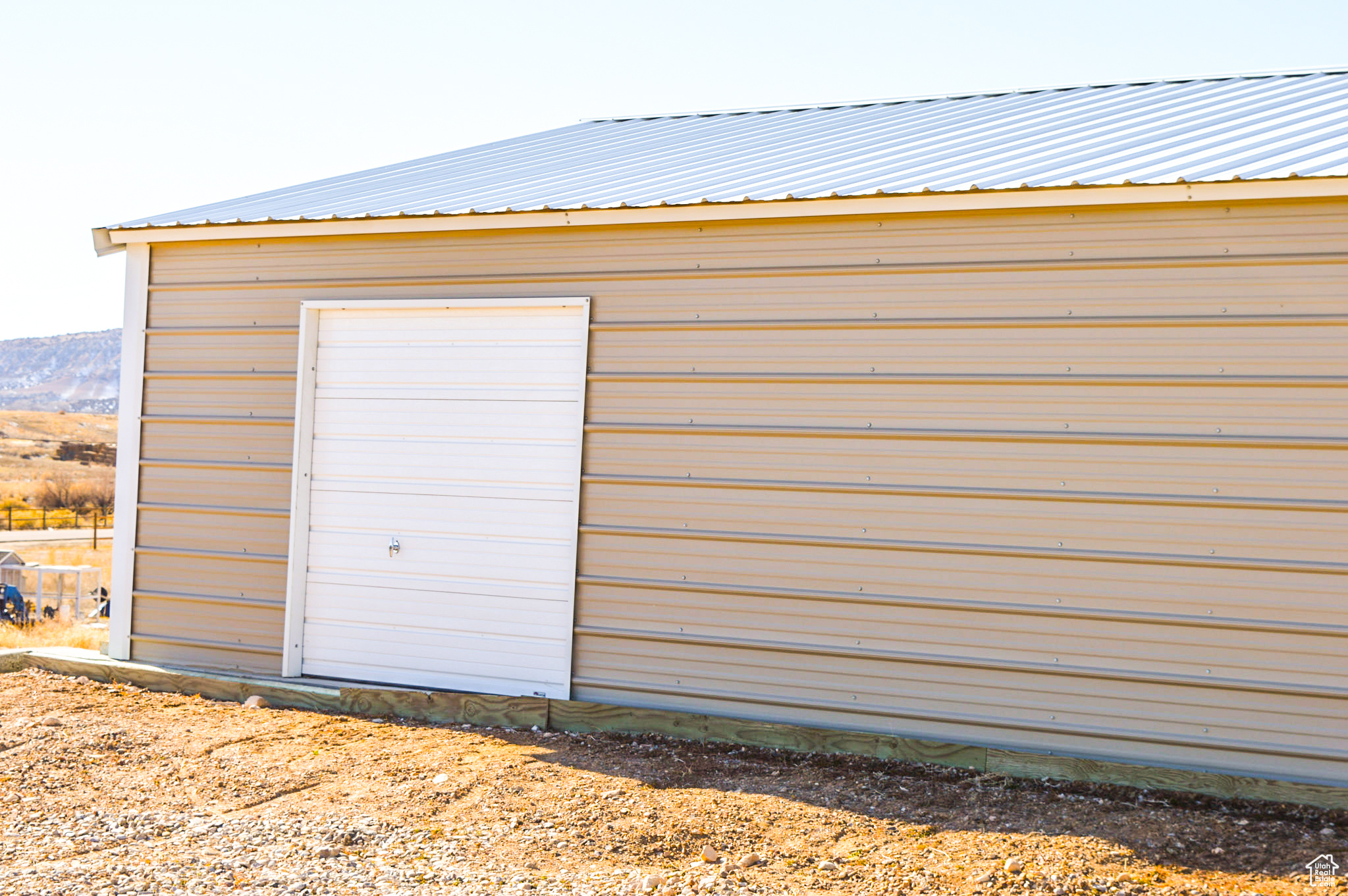 Extra overhead door in oversized garage.