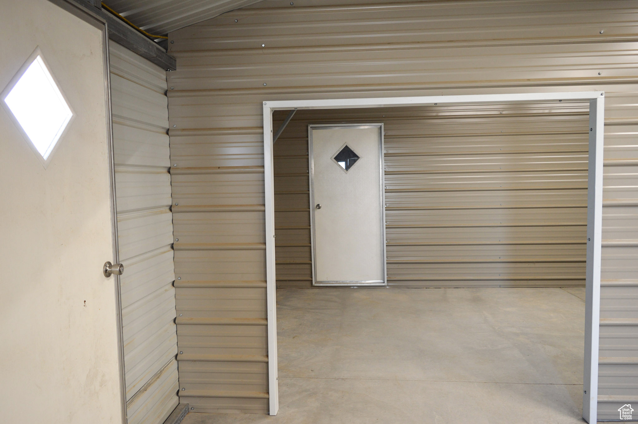 Access garage from front and side.  Last storage area can be accessed from inside or outside and also be totally closed off.