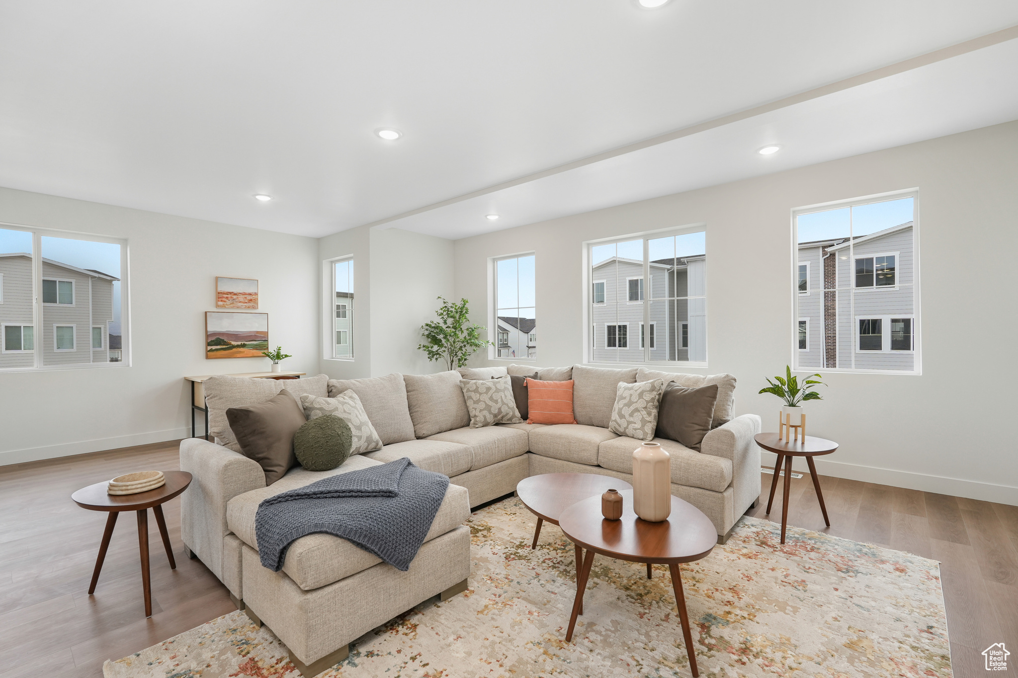 Living room with light hardwood / wood-style flooring