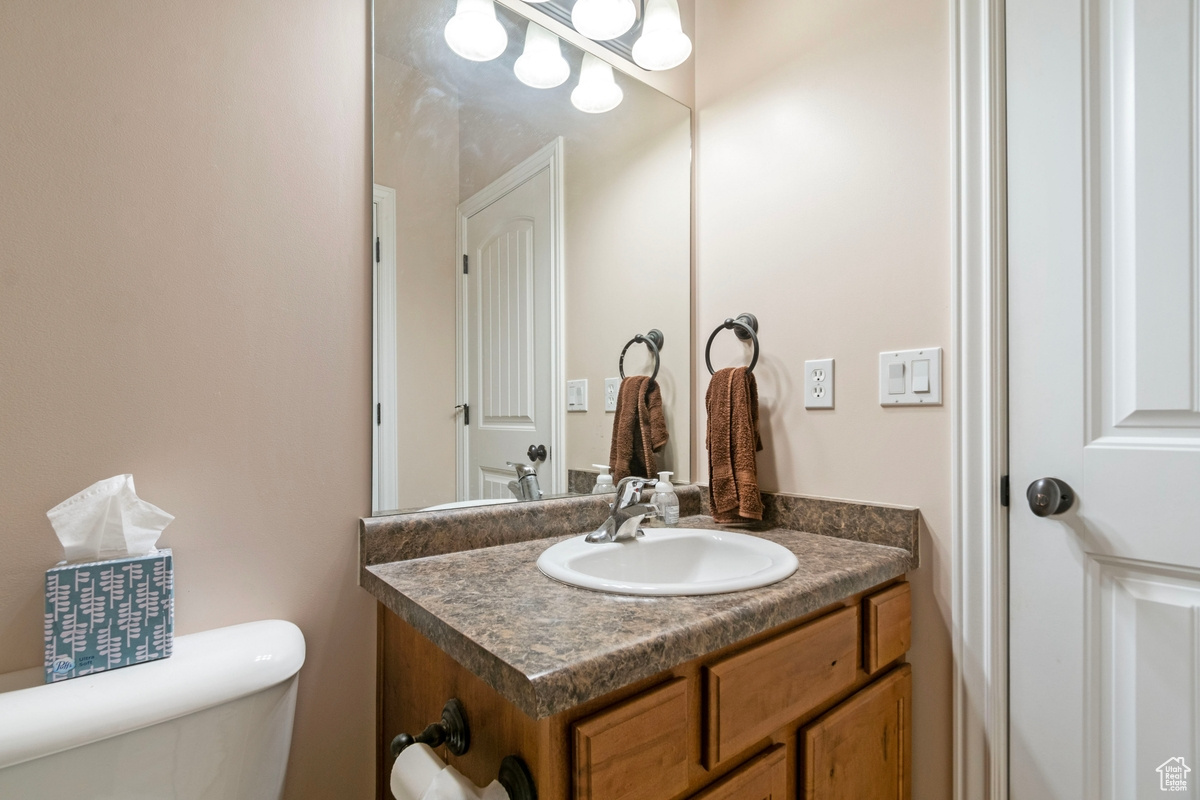 Bathroom with vanity and toilet