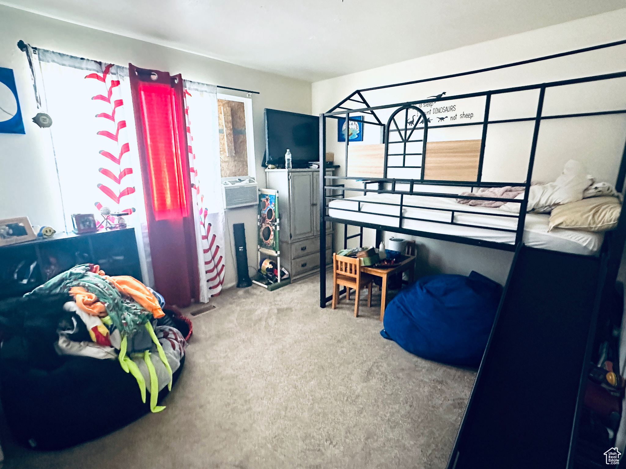 Bedroom featuring carpet floors