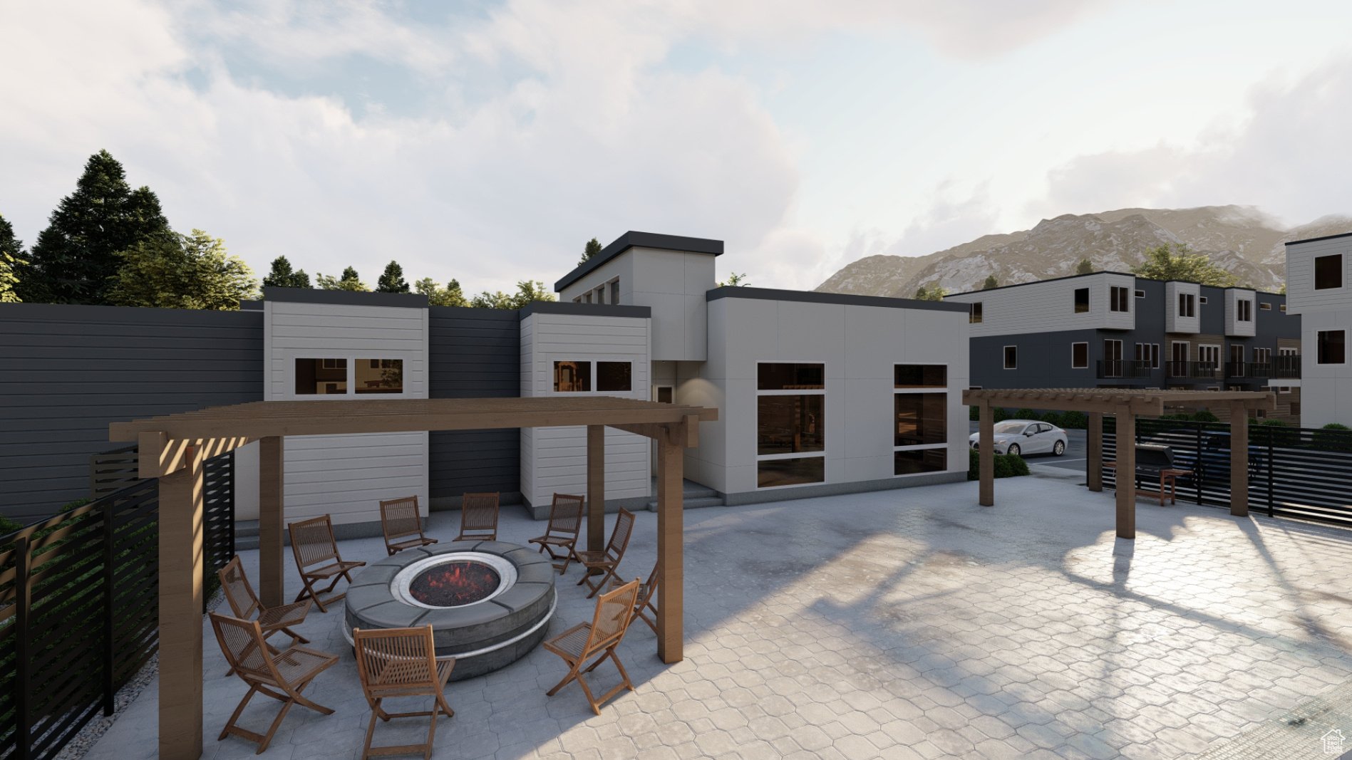 Outdoor amenities featuring a pergola, a mountain view, a fire pit, and a patio area