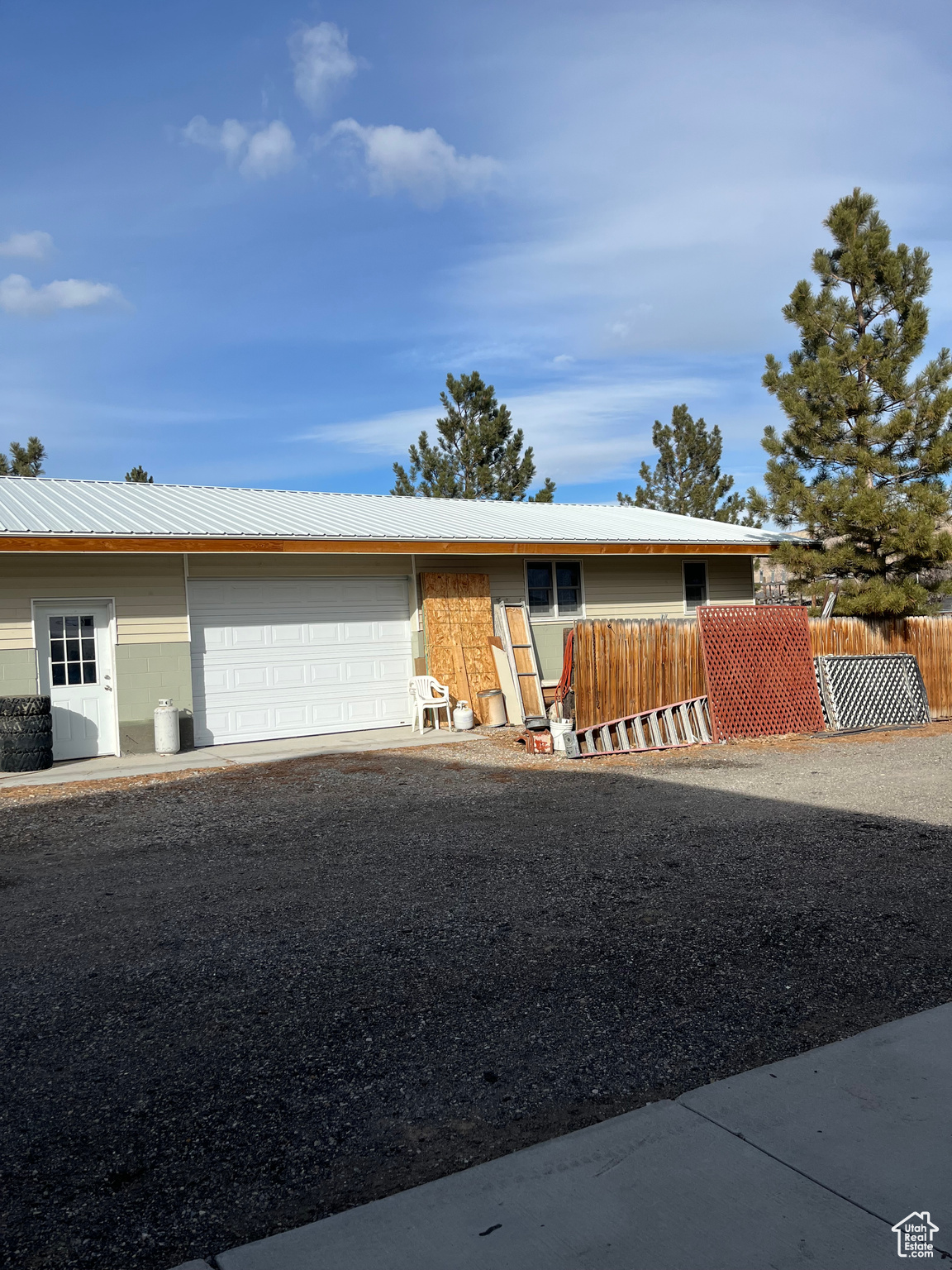 Ranch-style house featuring a garage