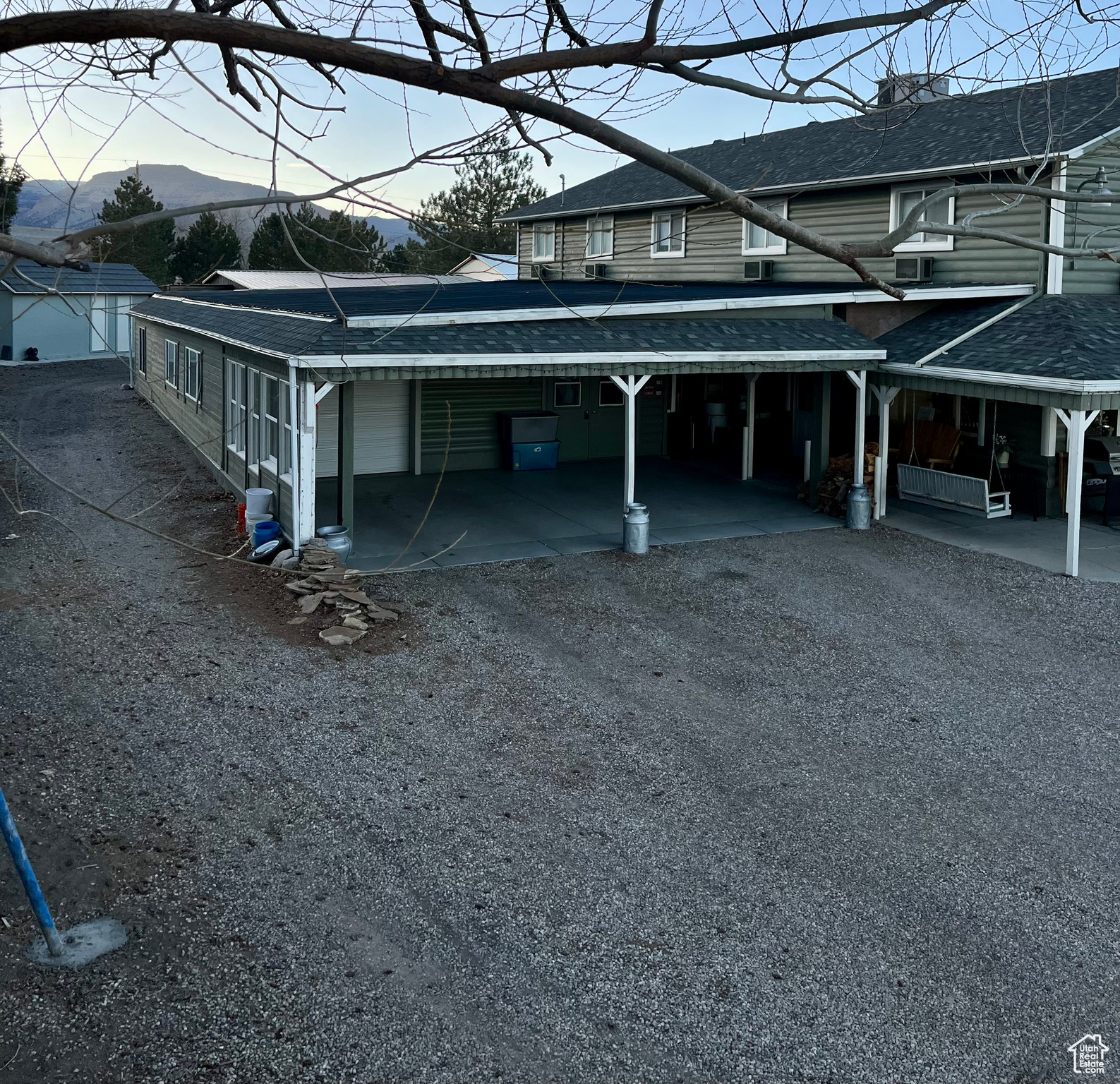 Exterior space featuring a carport and a mountain view