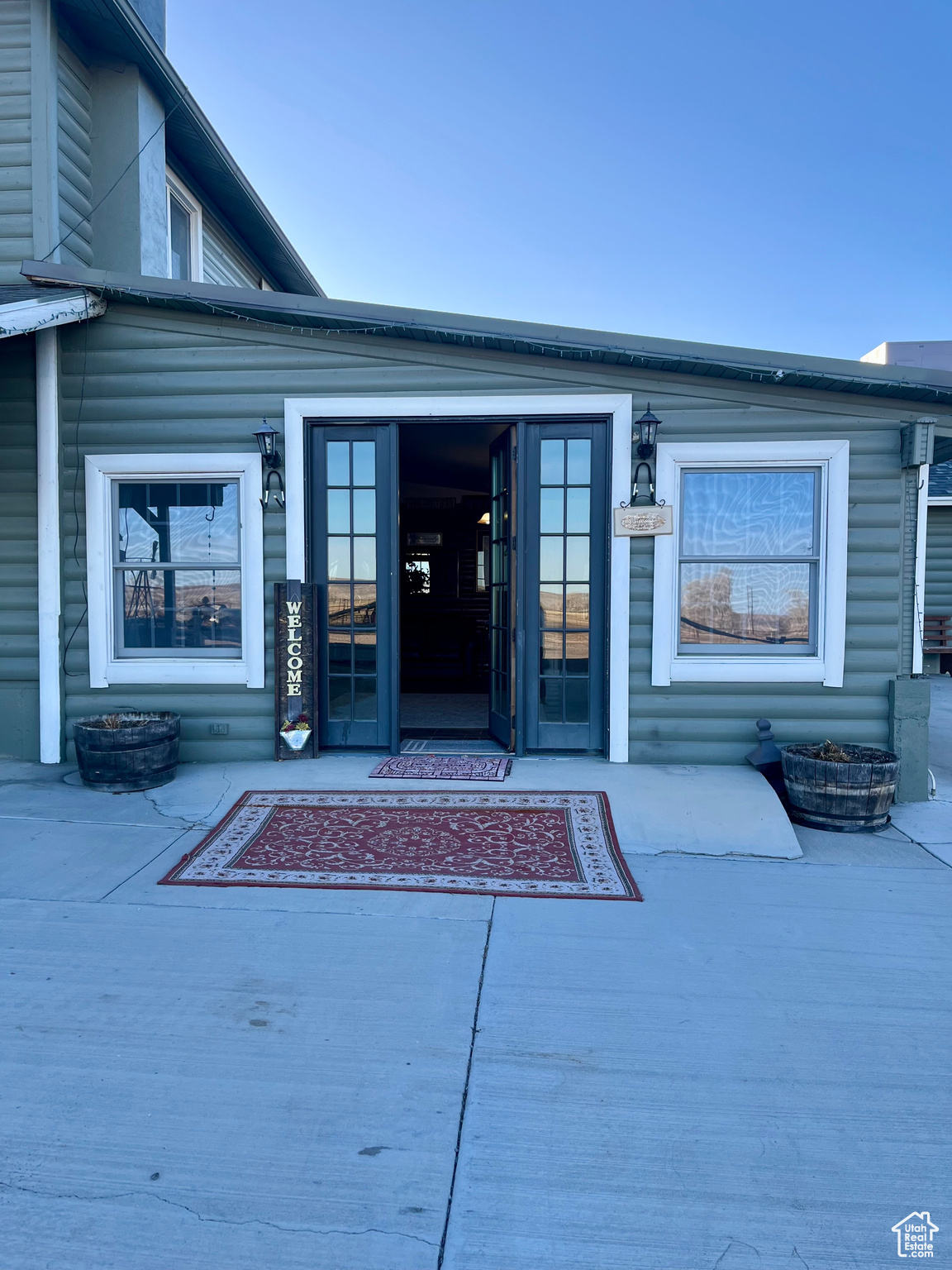 View of exterior entry to the large living room