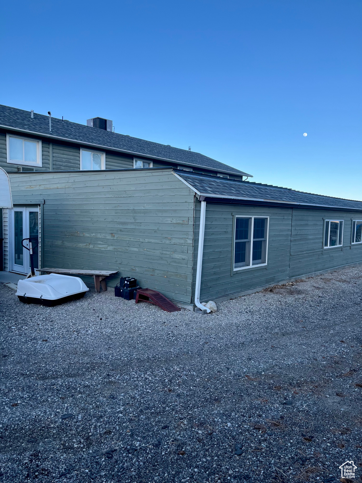 View of property exterior with central AC unit