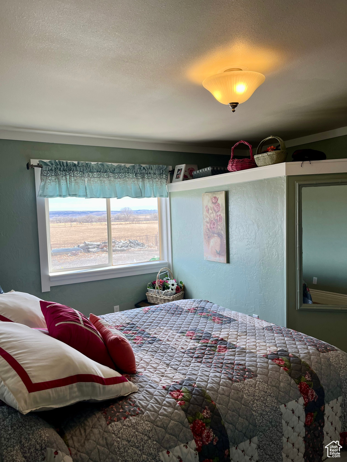Bedroom featuring a textured ceiling