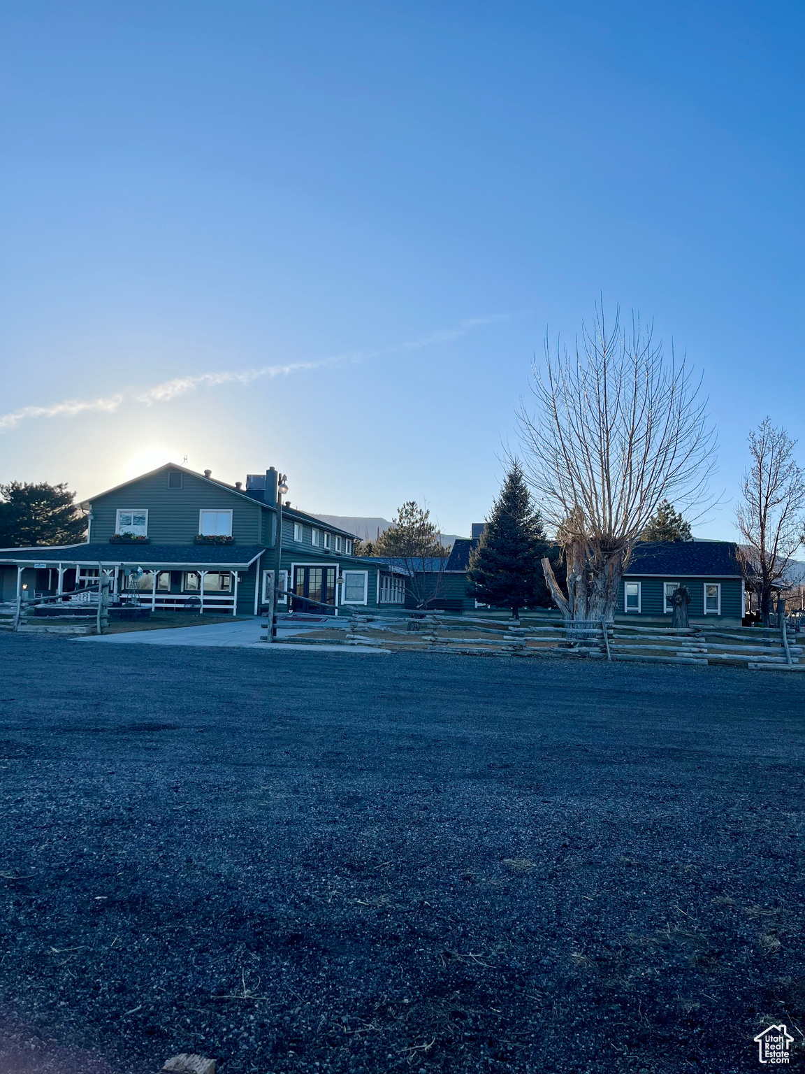 View of front of home featuring a front lawn