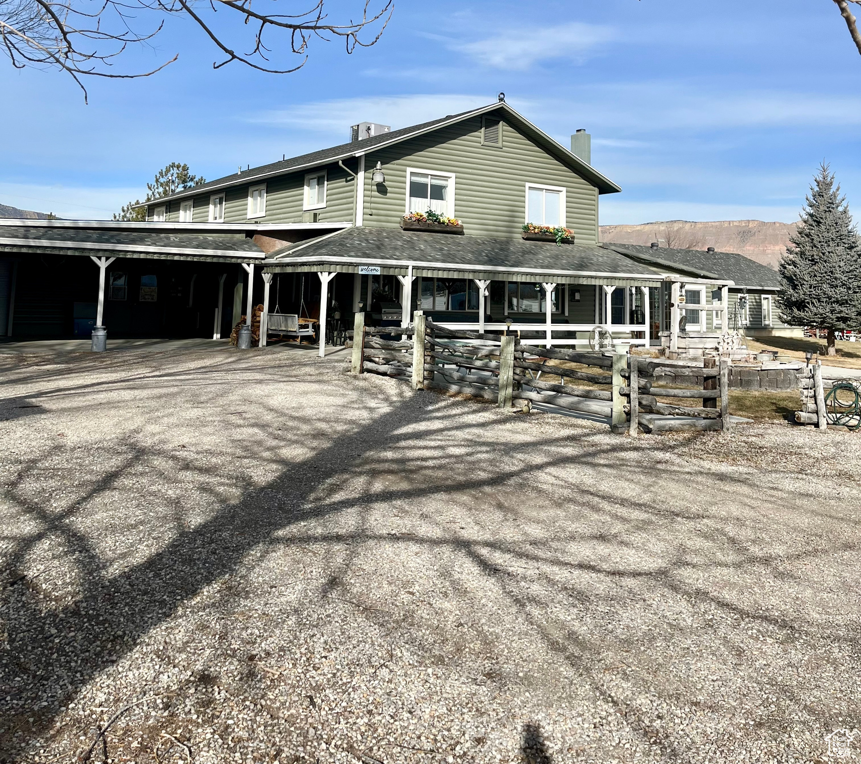 View of front of house featuring a mountain view
