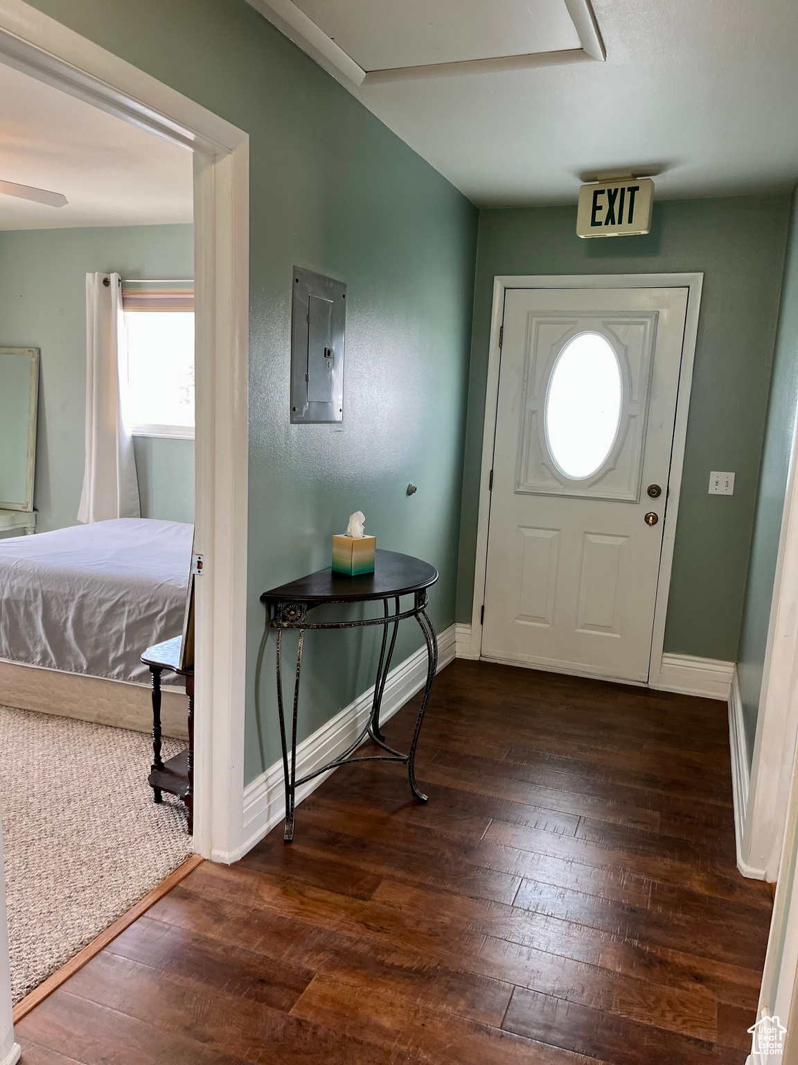 Foyer featuring dark hardwood / wood-style floors and electric panel