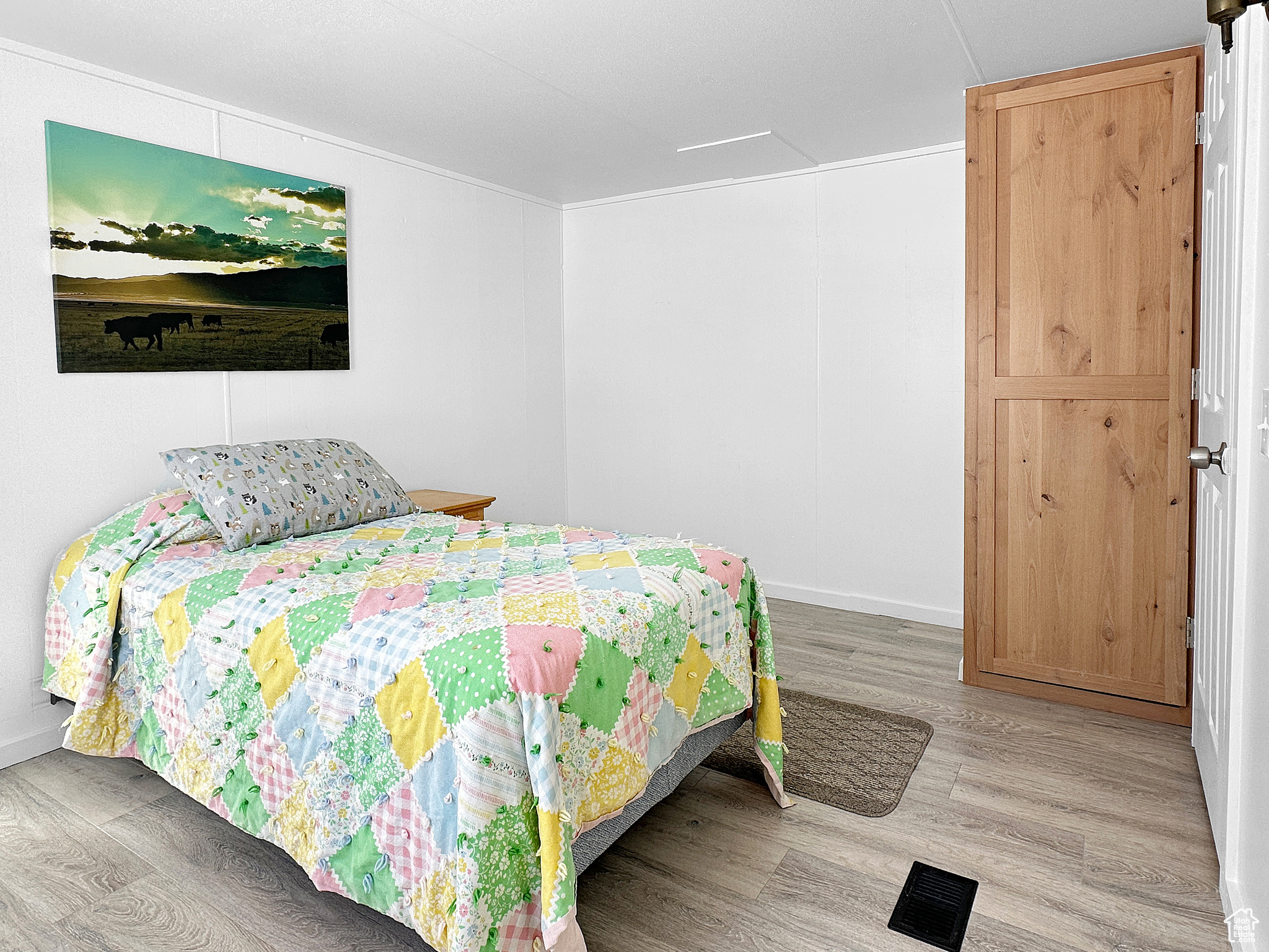 Bedroom featuring light wood-type flooring