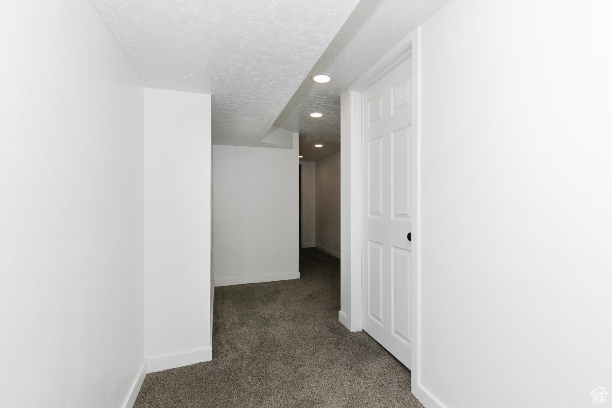 downstairs hallway to bedroom, bathroom, storage room