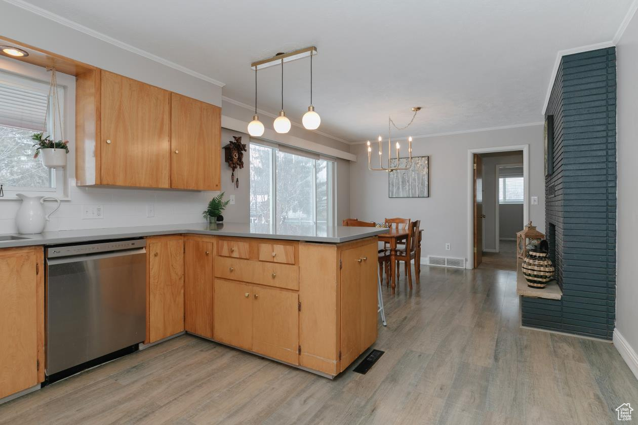 Kitchen with updated appliances, light fixtures, flooring, quartz countertops