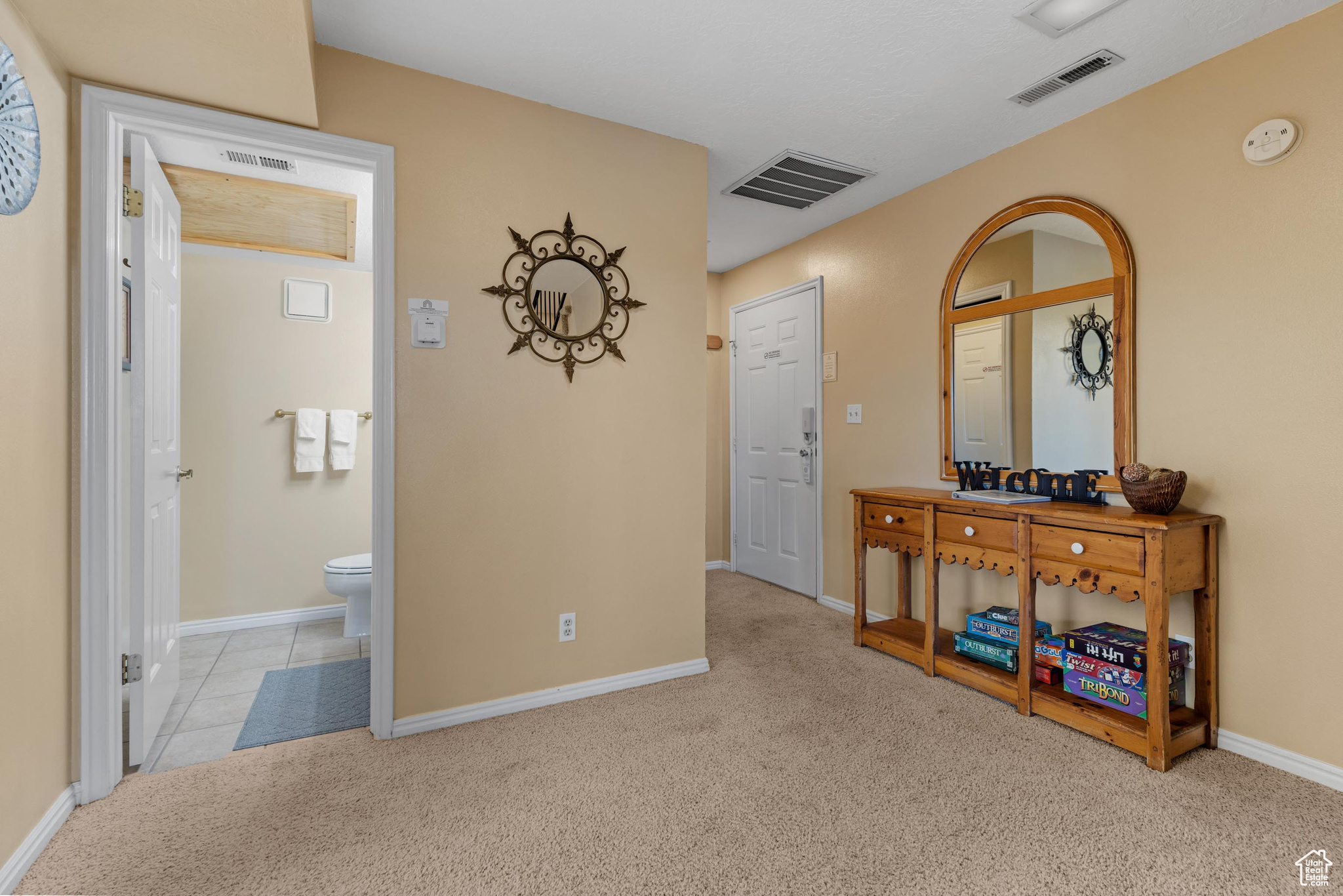 Interior space with light colored carpet