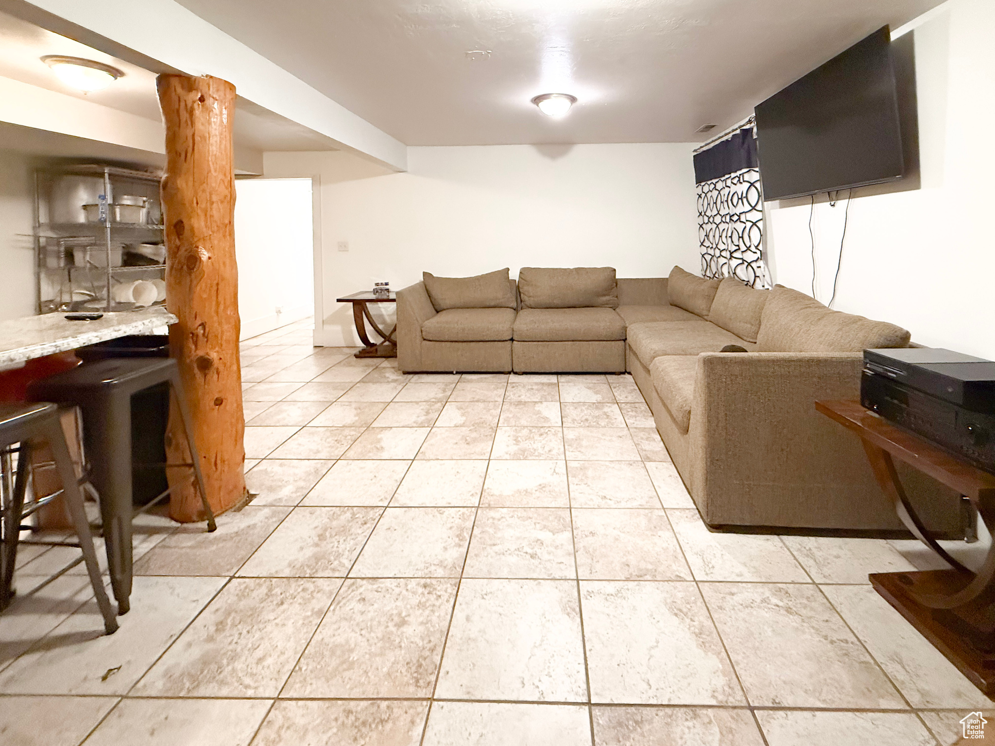 View of tiled living room