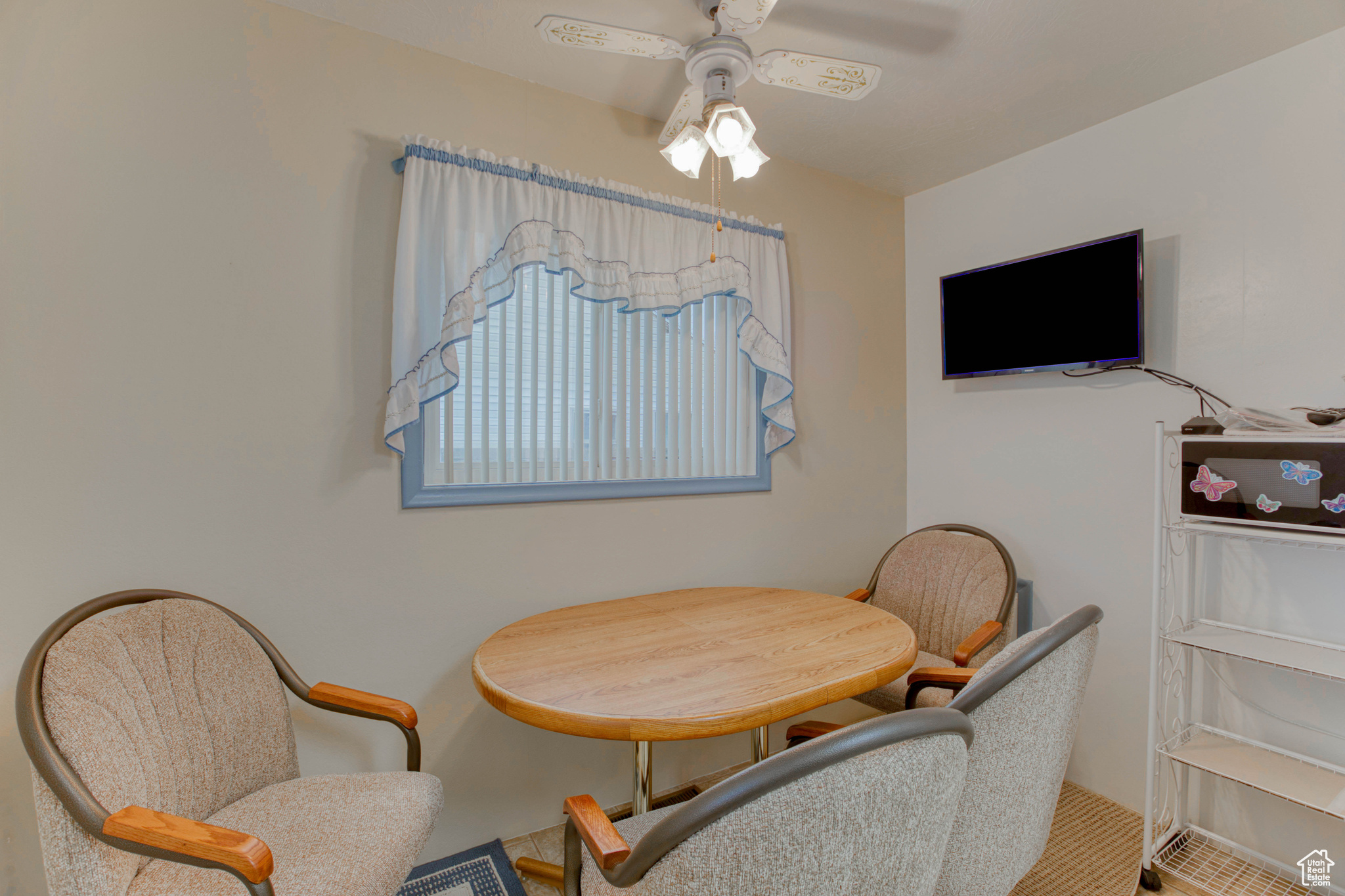 Dining room featuring ceiling fan