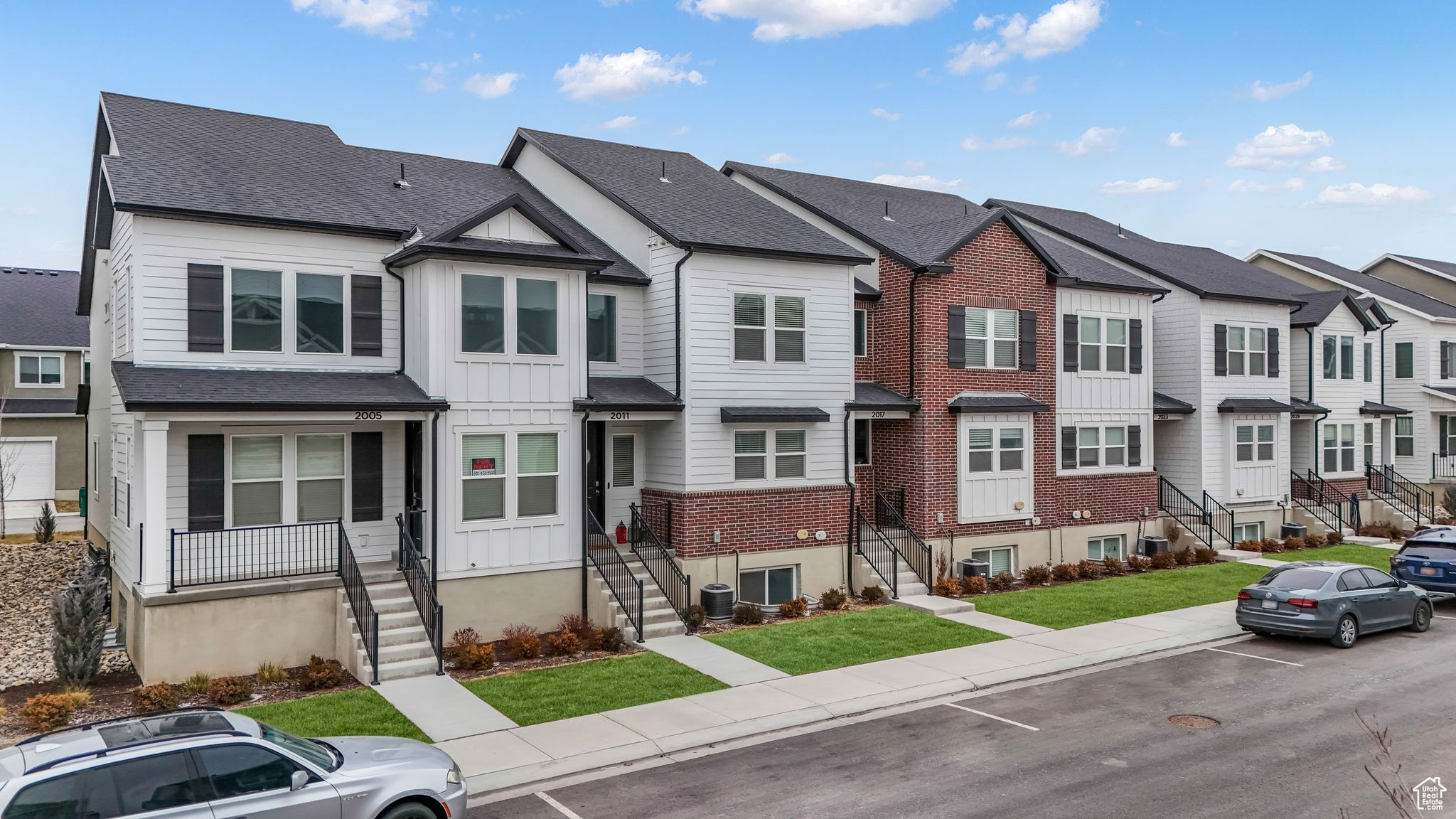 Multi unit property featuring central AC and a front yard