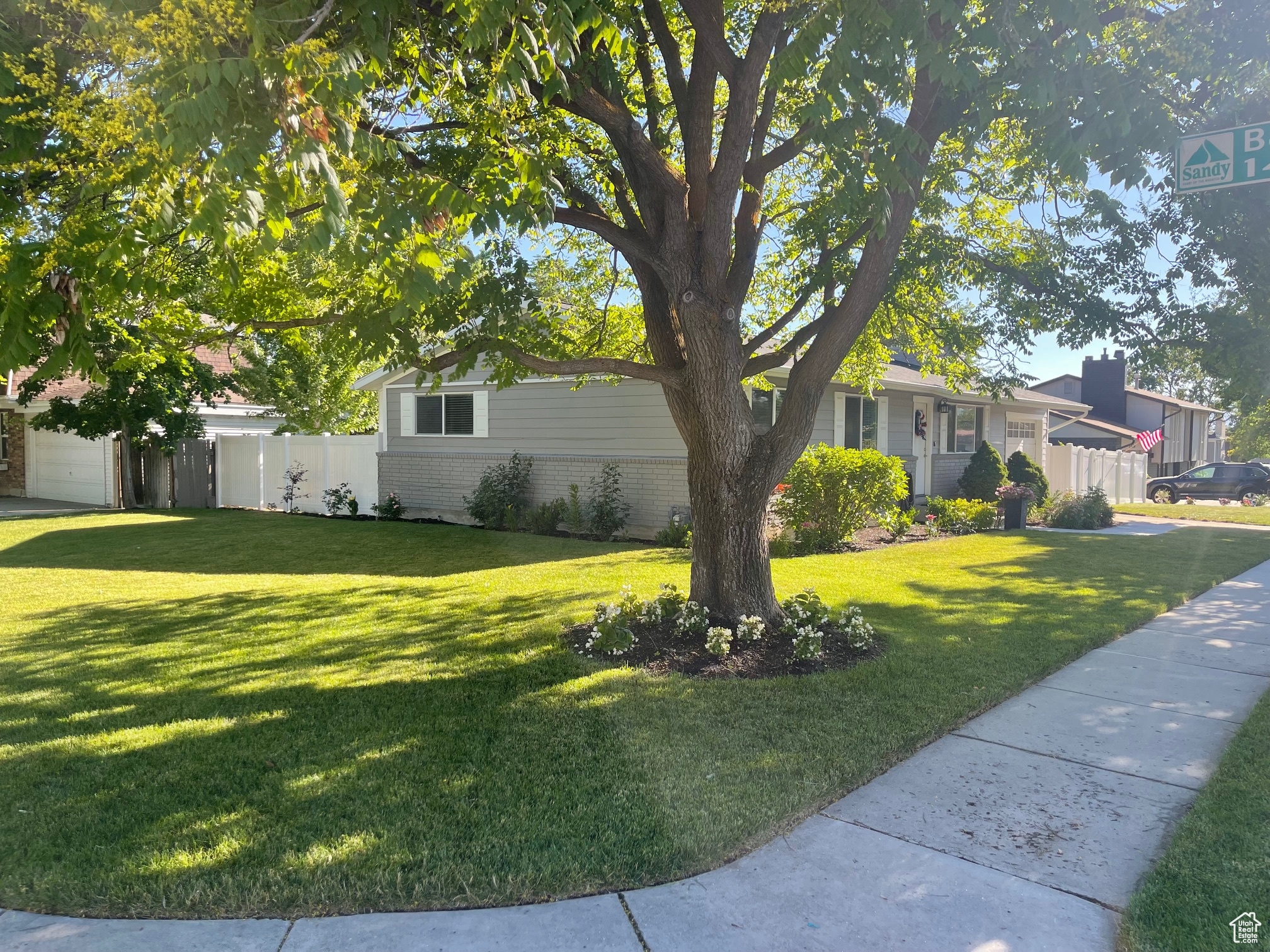 House & yard in the summer with the new beautiful Kentucky Blue grass