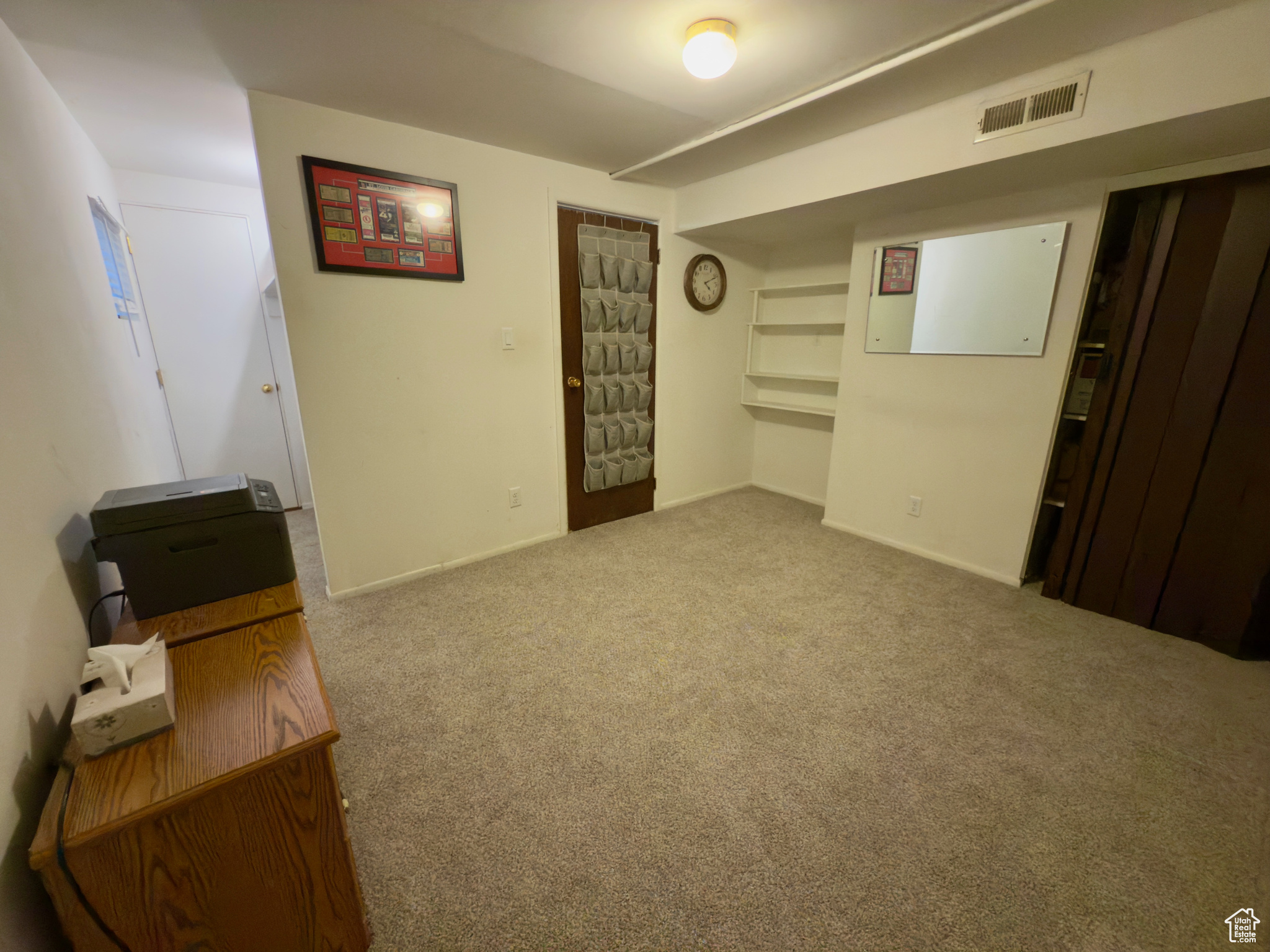 Basement bedroom with multiple closets